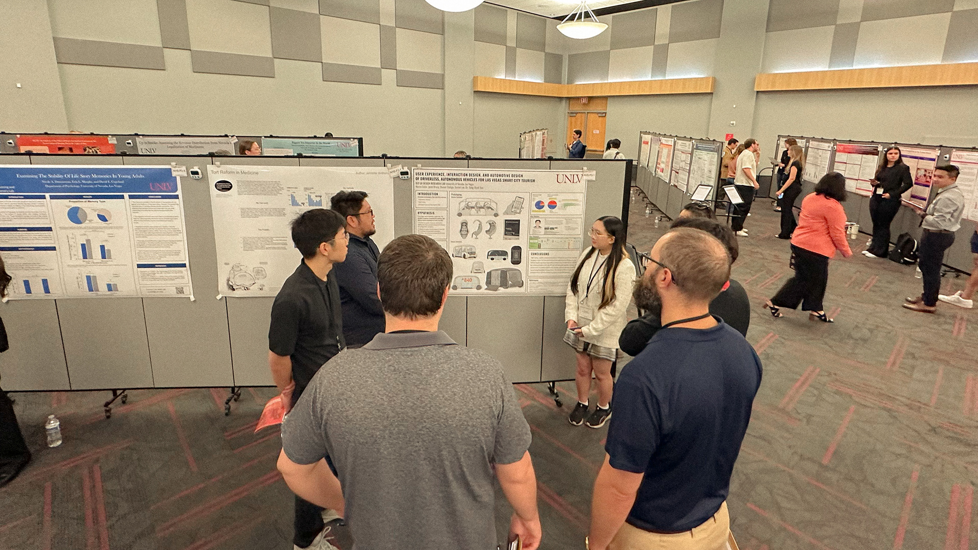 [ My team presenting our research poster to the judges ]