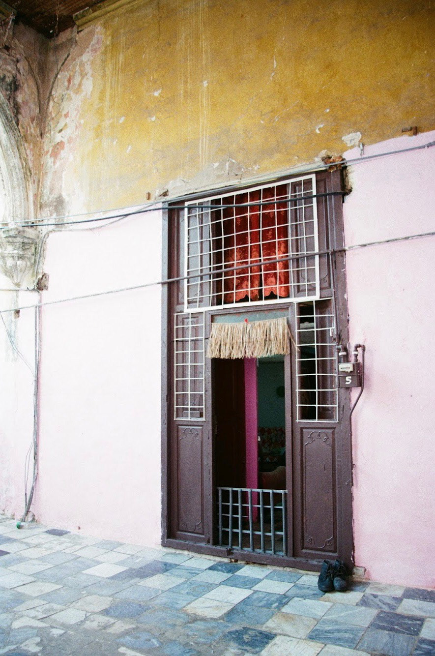 The straw fringe above the door signifies that a witch doctor lives here