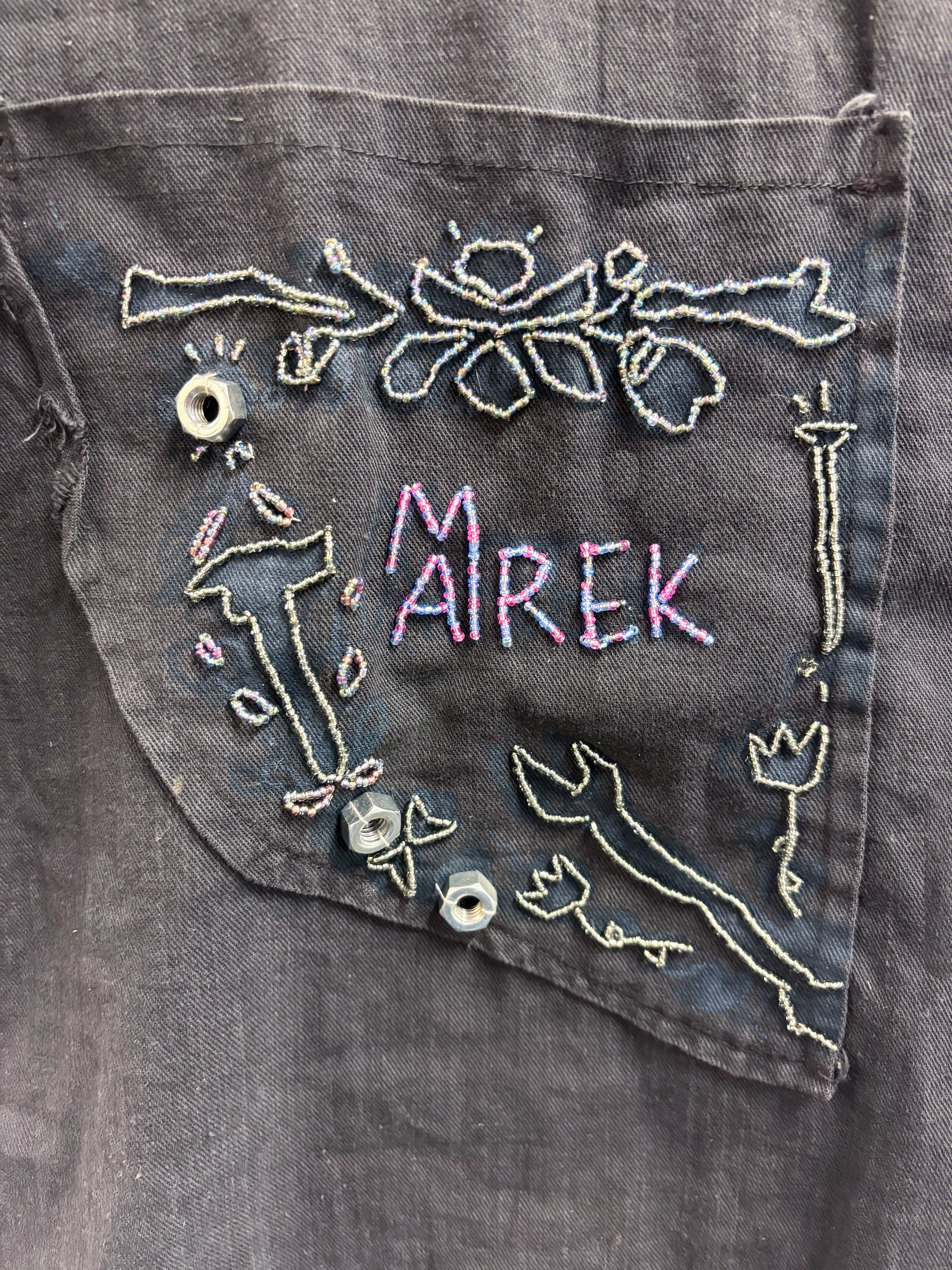 "Grandpa's Memorial Apron"  2025, beading and screen printing on Grandfathers apron