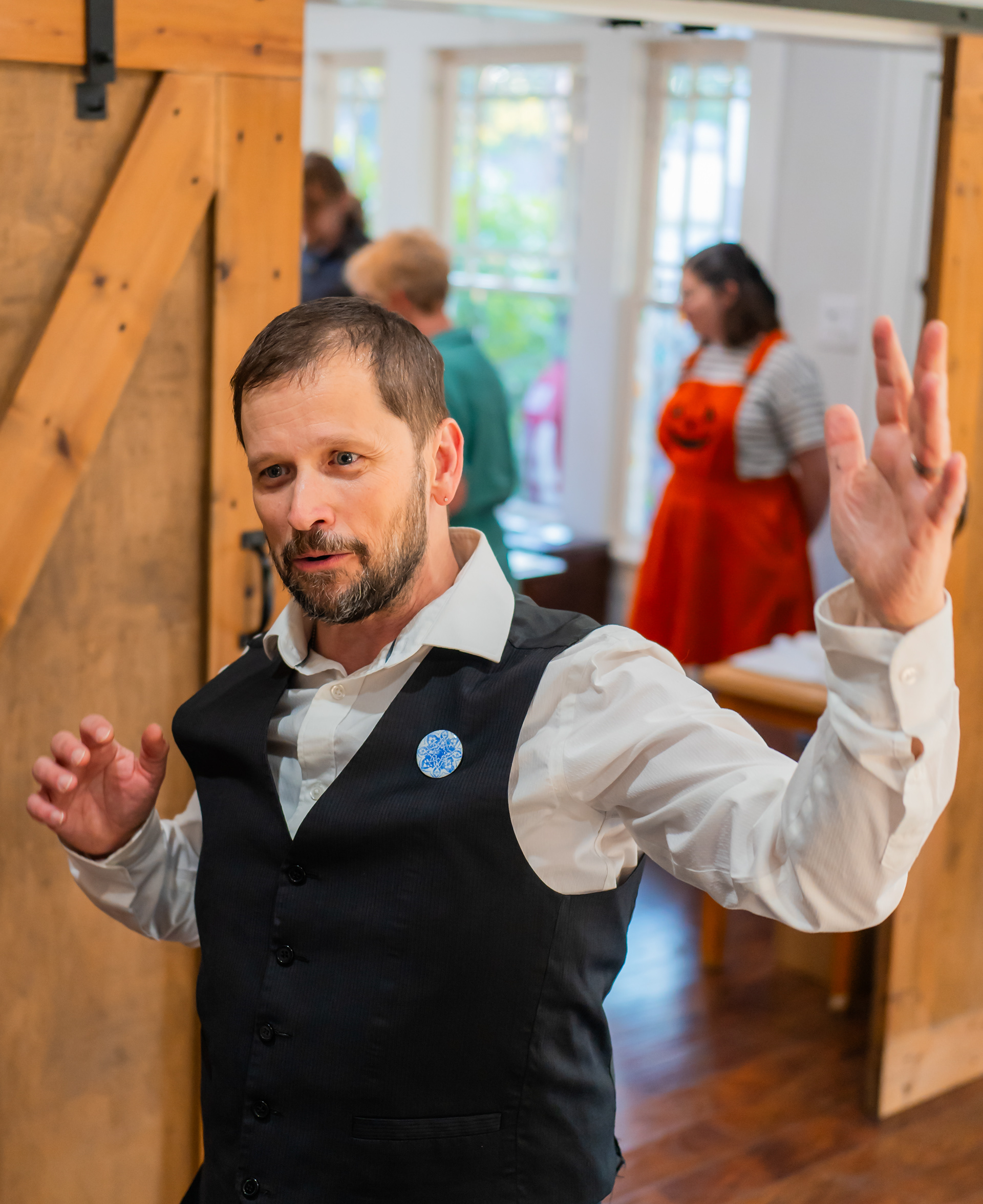 Energetic James: James Thurman converses with attendees at the soft open and silent auction event at the Denton Maker Center on Oct. 5, 2024