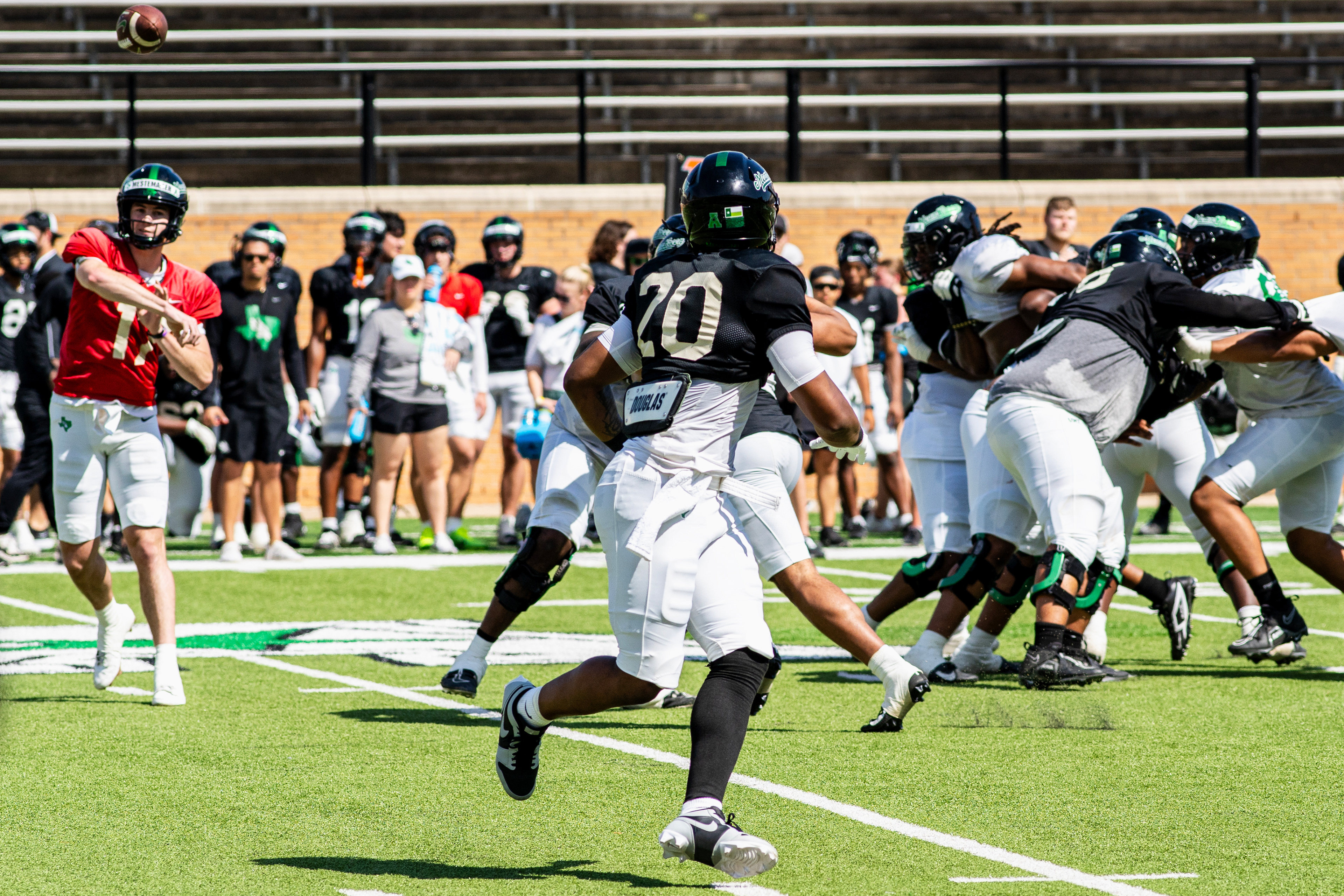 To the Sticks: Senior running back Damashja Harris receives a pass during UNT's scrimmage at DATCU Stadium.