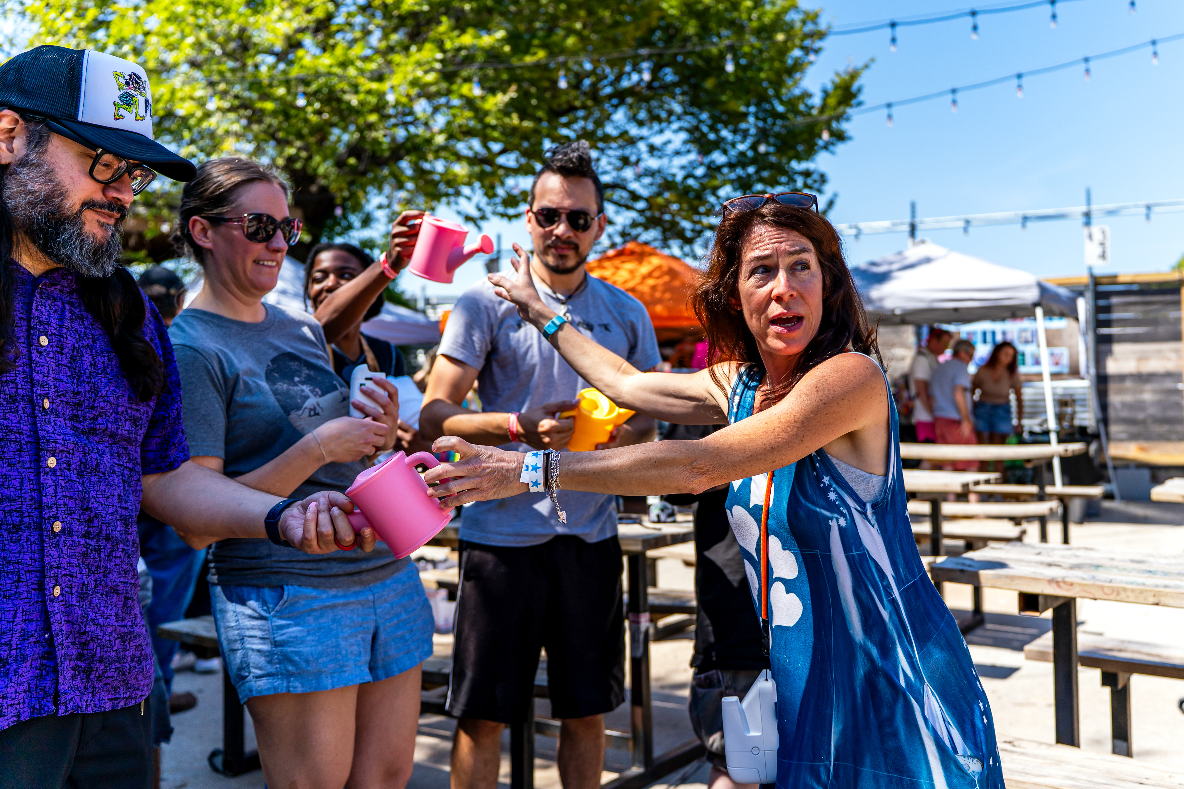 Amy Jasek gives props to Polacon attendees before her large-scale cyanotype workshop at Rubber Gloves in Denton, TX on Sept. 27, 2025.