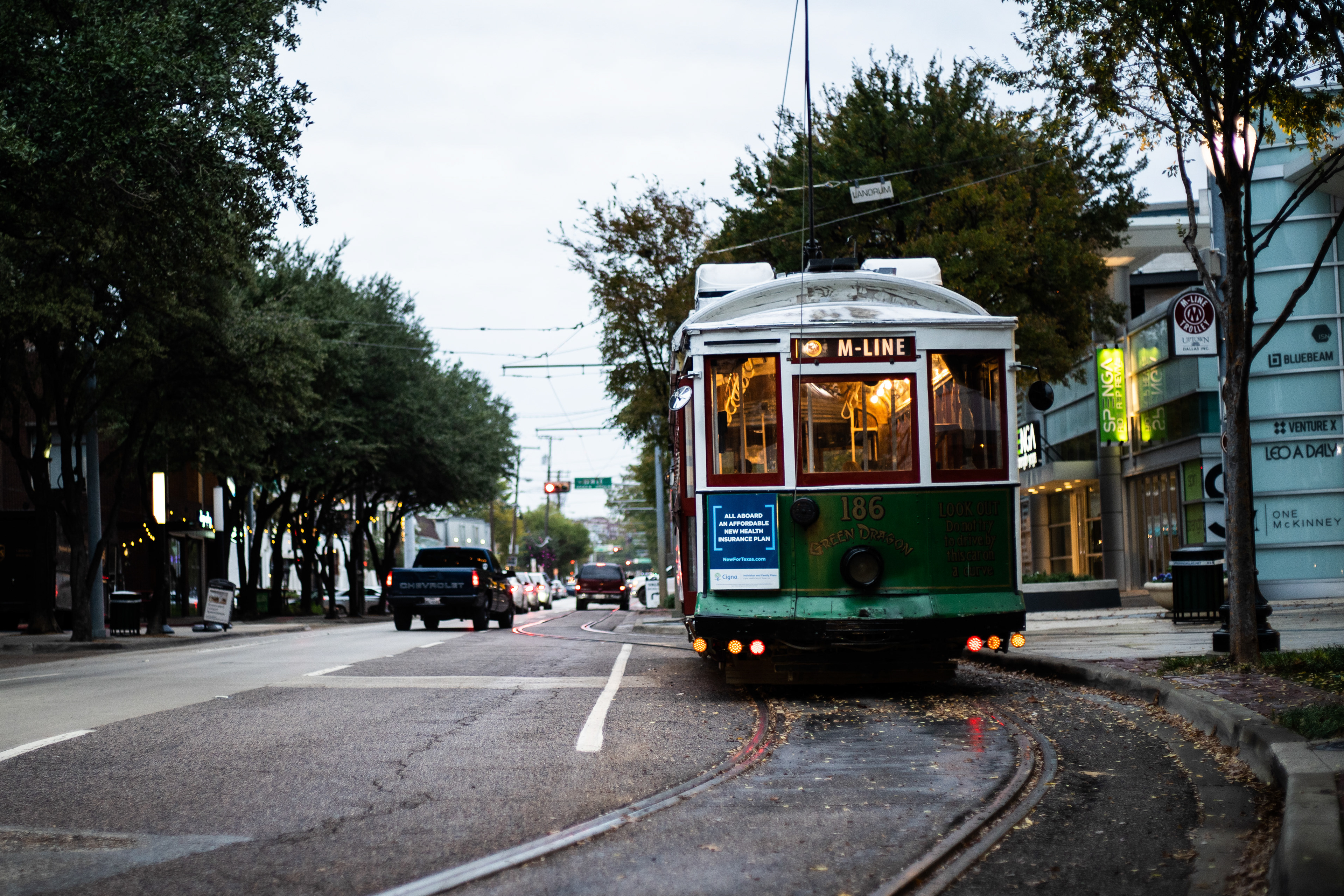 Car 186, Green Dragon, heads down McKinney Avenue. 