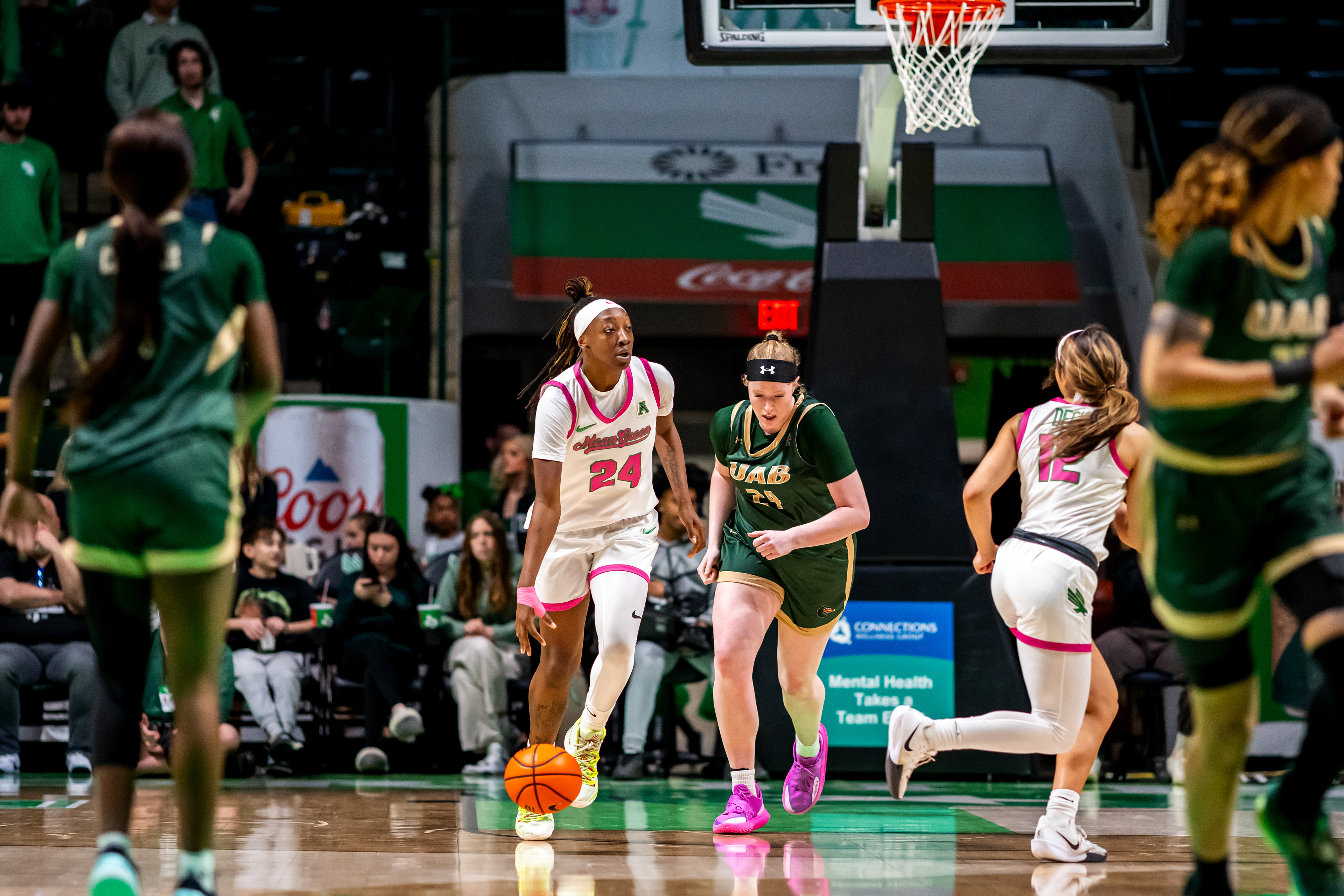 Senior forward Tommisha Lampkin dribbles down the court during the game against UAB at The Super Pit.