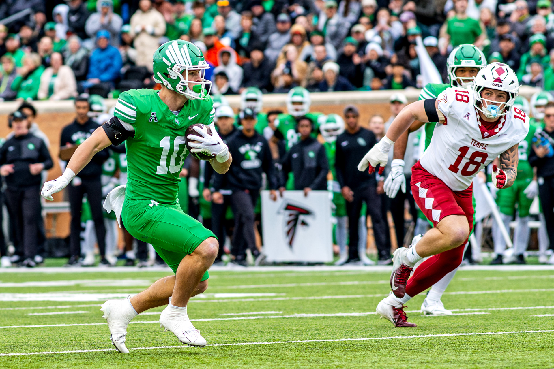 Sophomore wide receiver Wyatt Young evades defenders against Temple at DATCU Stadium in Denton, TX on Nov. 28, 2025.