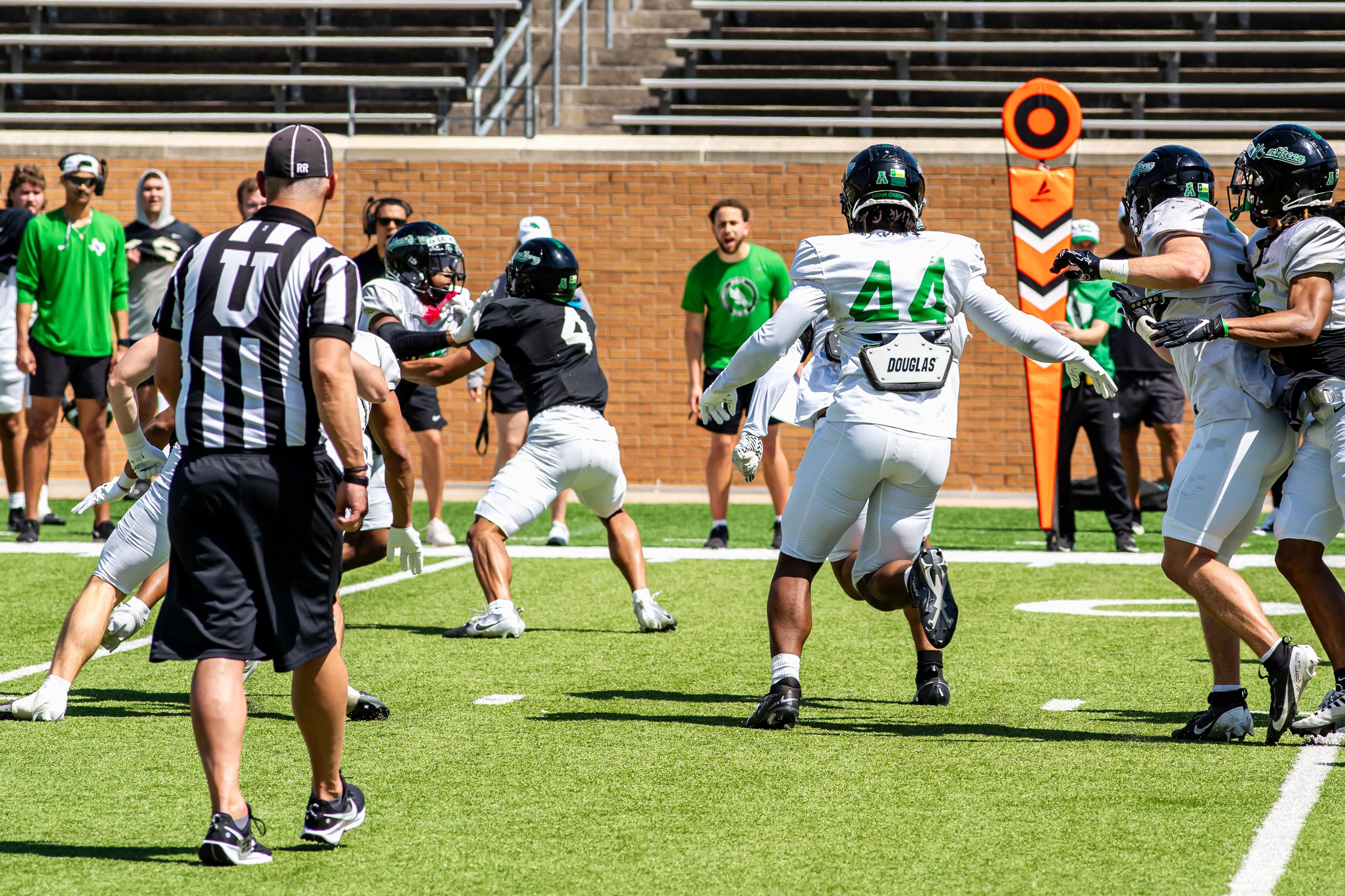 Pursue the Ball: Senior defensive lineman Briceon Hayes pursues the ball carrier during UNT's scrimmage at DATCU Stadium.