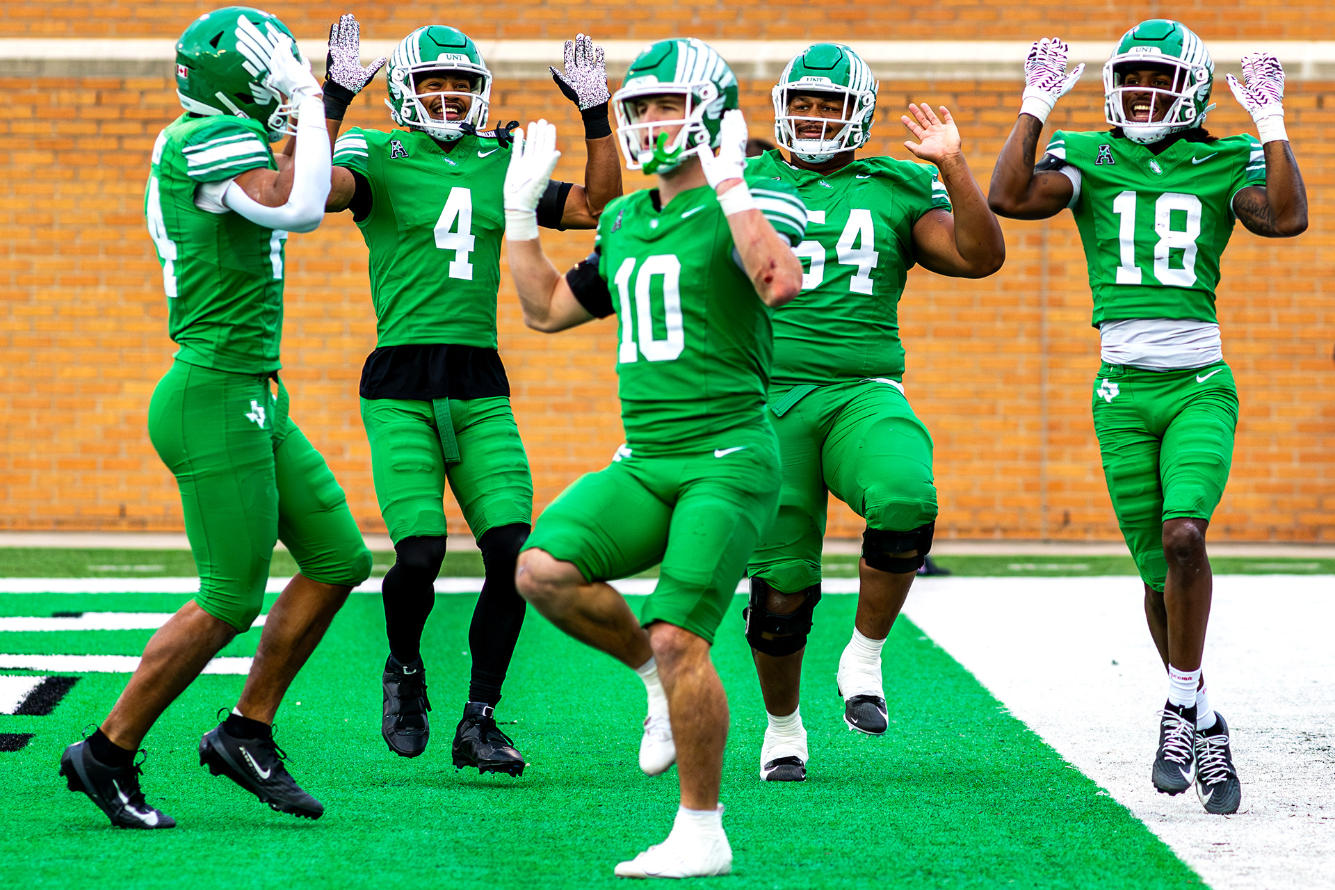 UNT football celebrates after a touchdown against Temple at DATCU Stadium in Denton, TX on Nov. 28, 2025