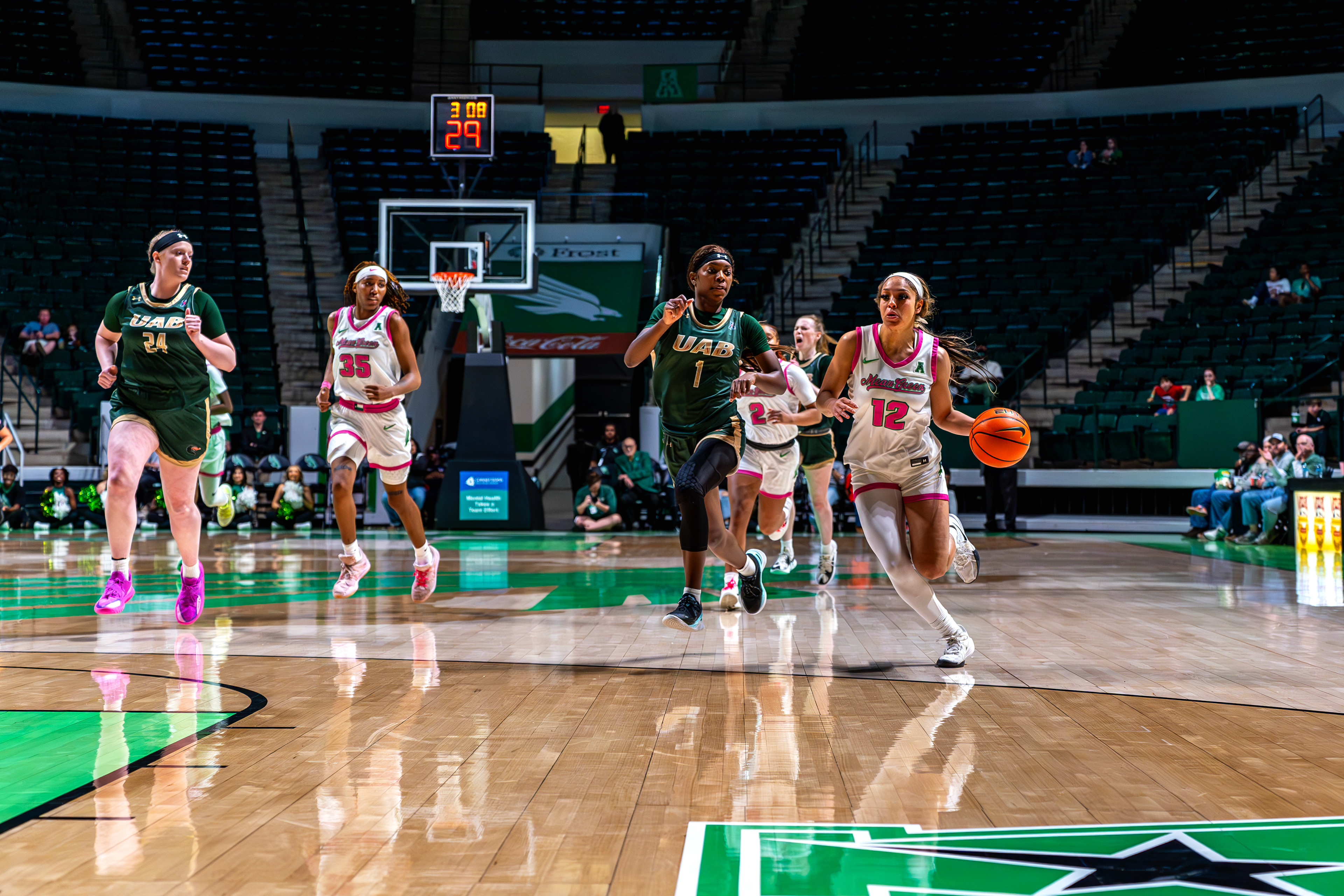 Junior guard Kyla deck dribbles towards the basket during the game against UAB at The Super Pit on March 01, 2025.