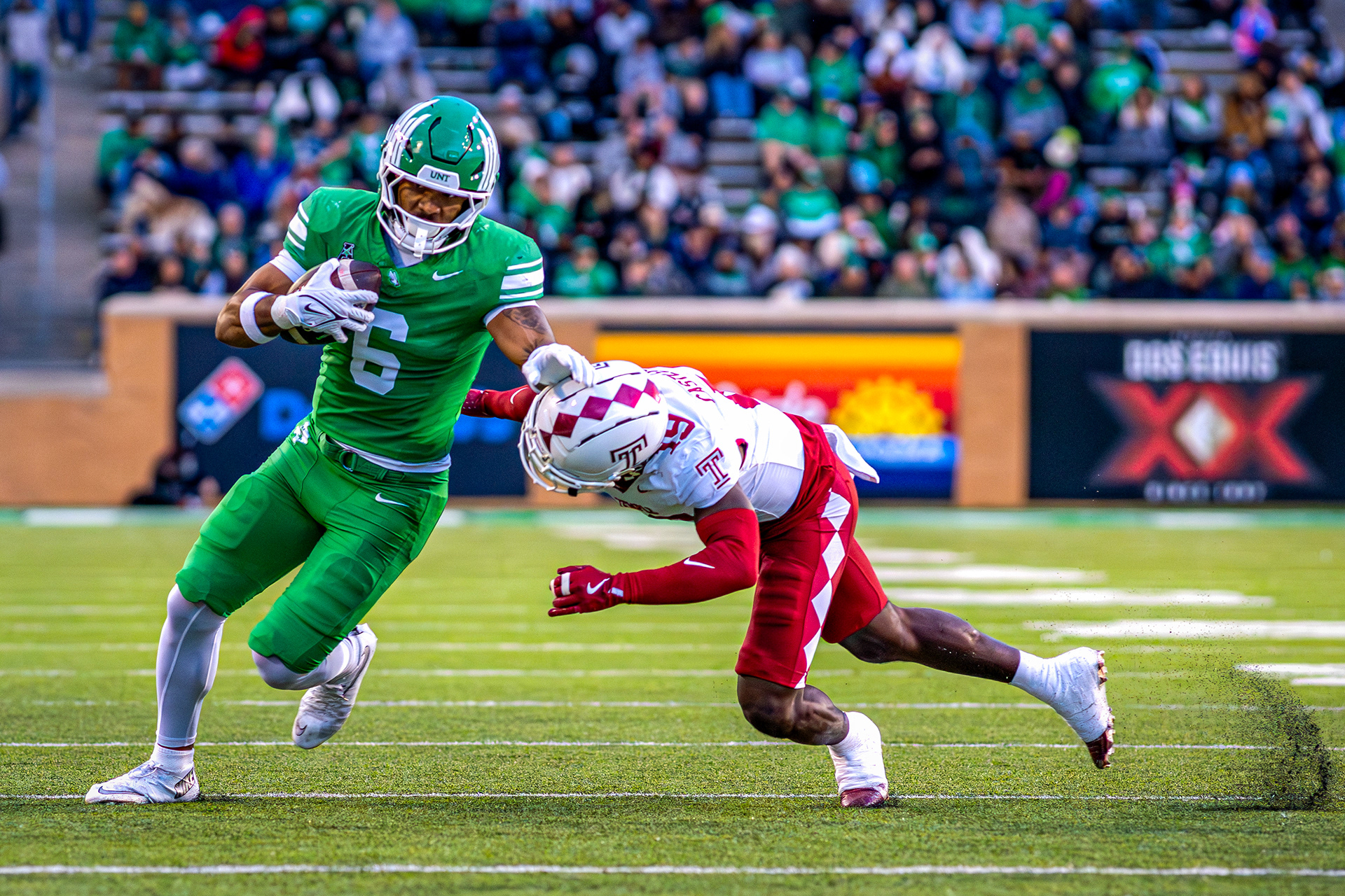 Senior tight end Tre Williams III evades a defender against Temple at DATCU Stadium in Denton, TX on Nov. 28, 2025.