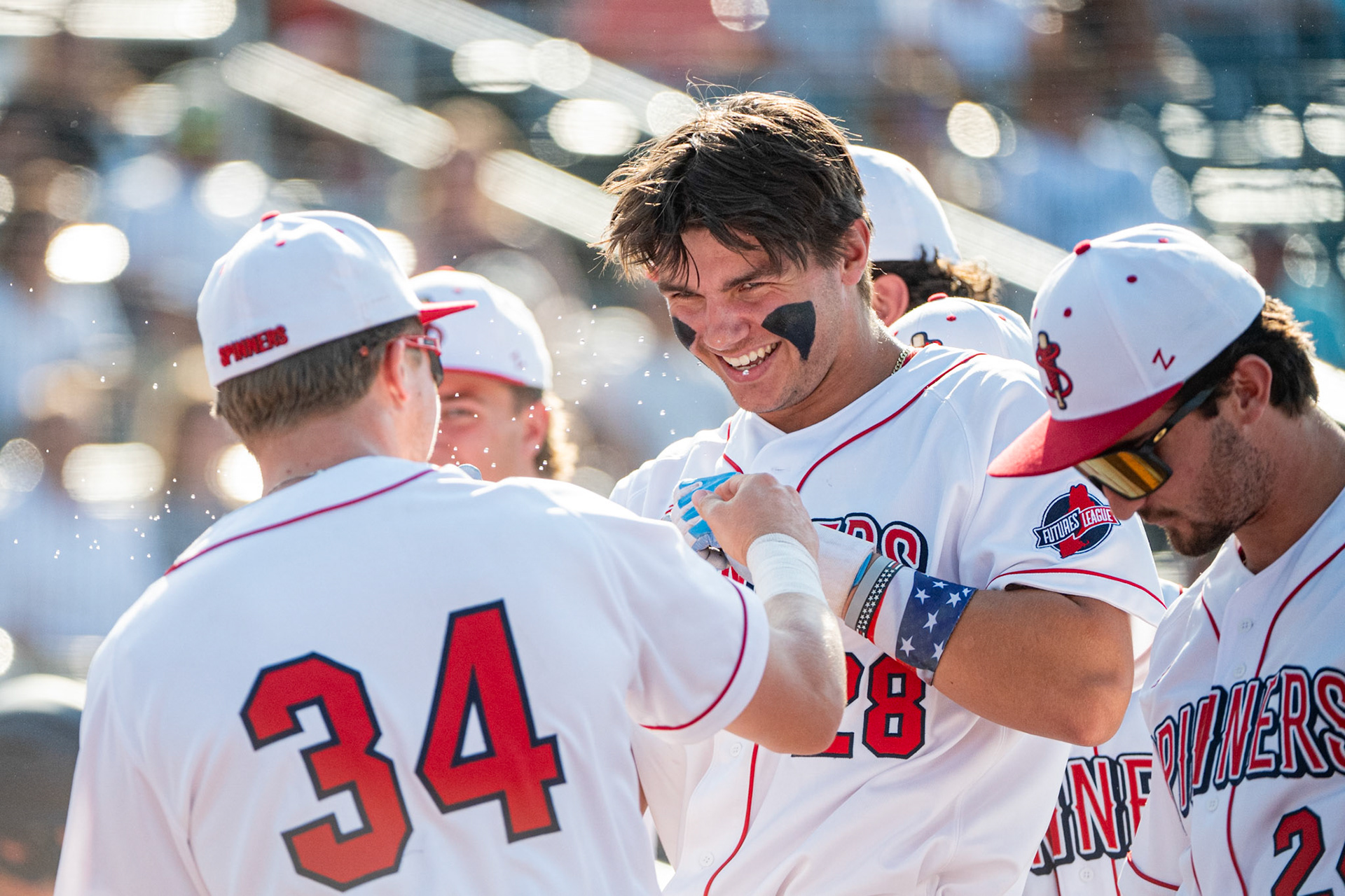 Lowell Spinners' Cam Biller celebrates with the rest of the team after hitting a home run. The game was played at Edward A. LeLacheur Park, in Lowell, MA, on July 11th, 2026.