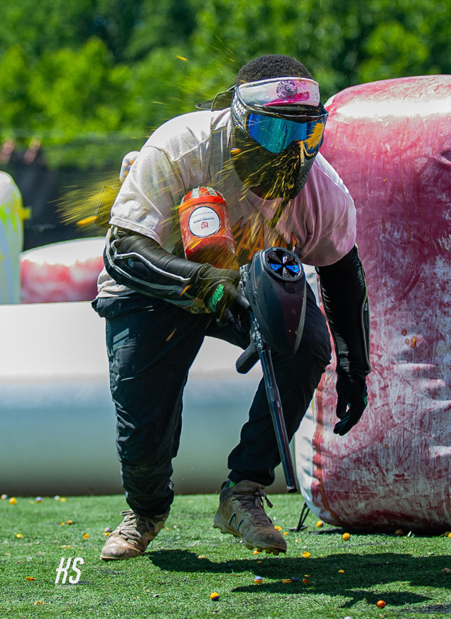 A member of the DC Banished Paintball Team gets shot in the mask by a No Limits Paintball team player during a practice match at Central Avenue Paintball Park in Bowie, MD, on June 26, 2023.