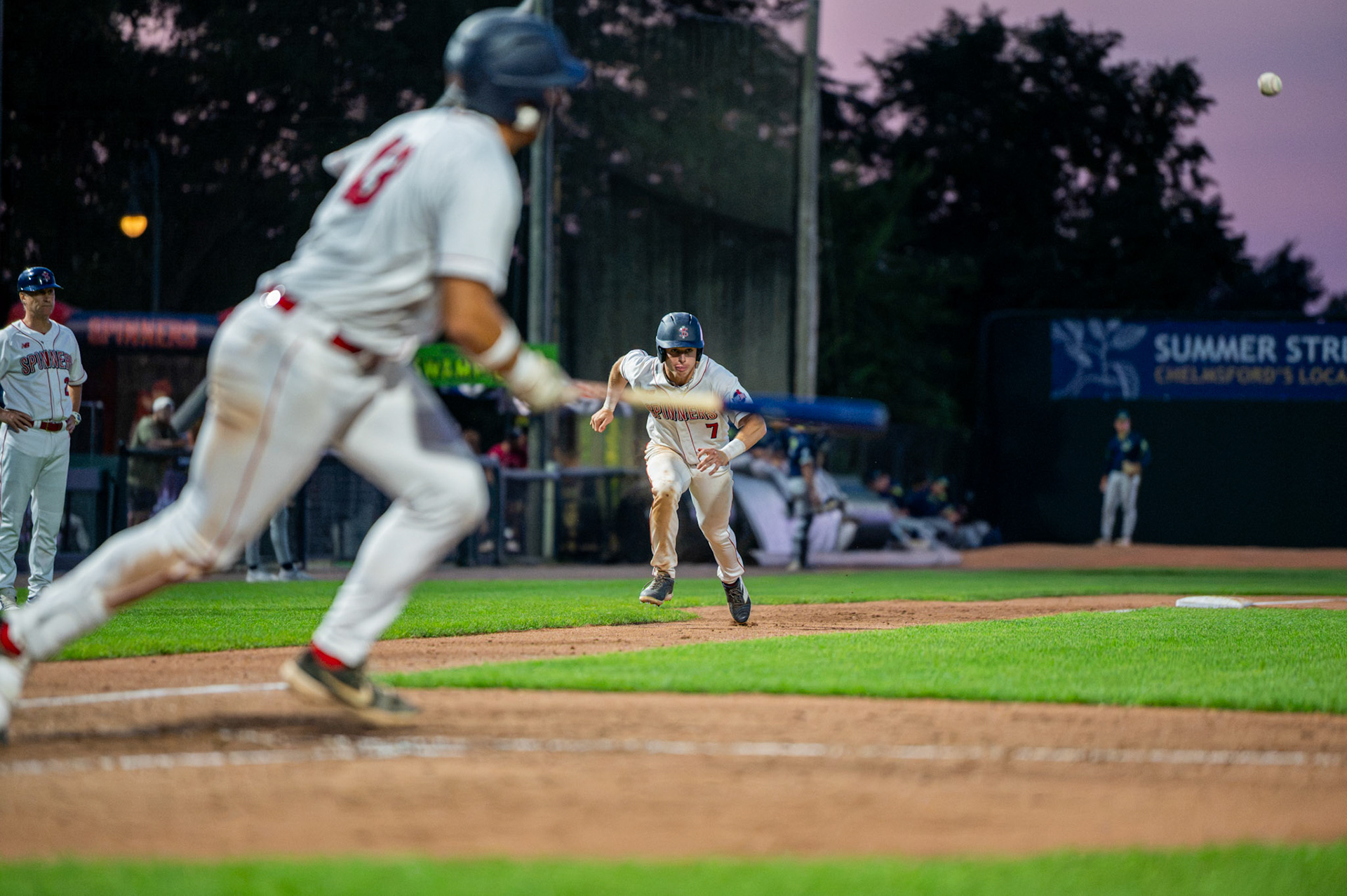 Lowell Spinners' Jordan Henriquez sprints to home plate as his teammate, Esteben Dessureault earns a hit. The game was played at Edward A.LeLacheur Park in Lowell, MA, on June 29th, 2026..