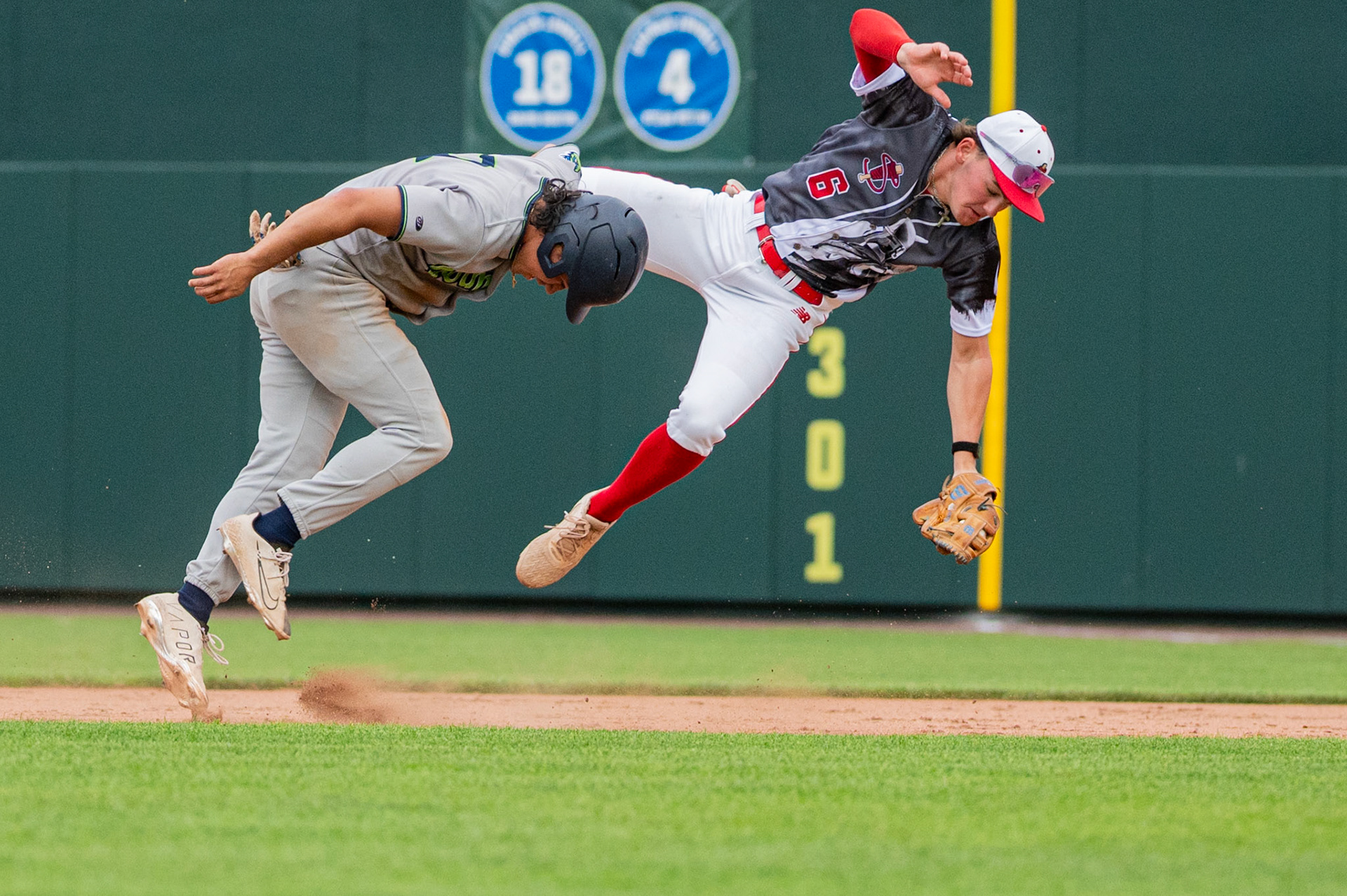 Lowell Spinners' infielder, Quincy Kerr collides with a baserunner from the Vermont Lake Monsters, during the game at Edward A. LeLacheur Park in Lowell, MA, on June 7th, 2026
