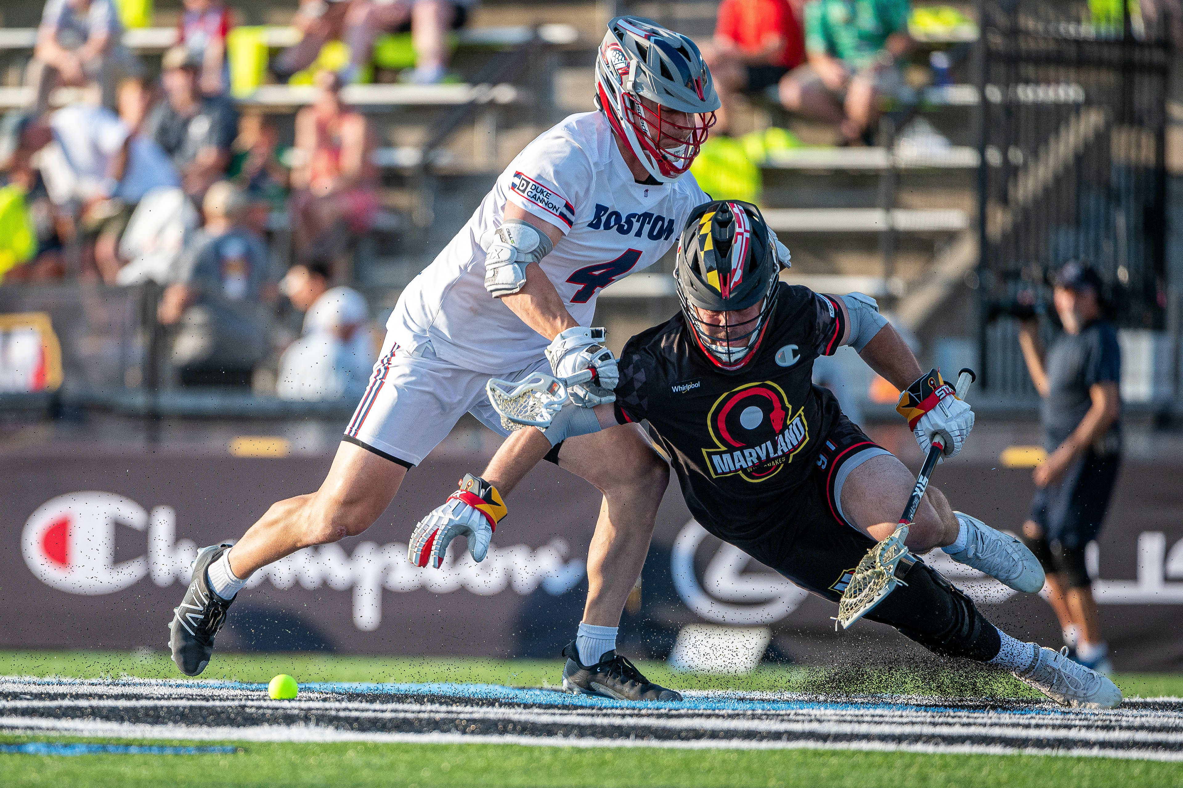 Joseph Nardella of the Maryland Whipsnakes battles Zac Tucci of the Boston Cannons for possession during a faceoff at a Premier Lacrosse League game on June 22, 2025, at Homewood Field in Baltimore. The game was part of the league’s 2025 Baltimore Weekend.