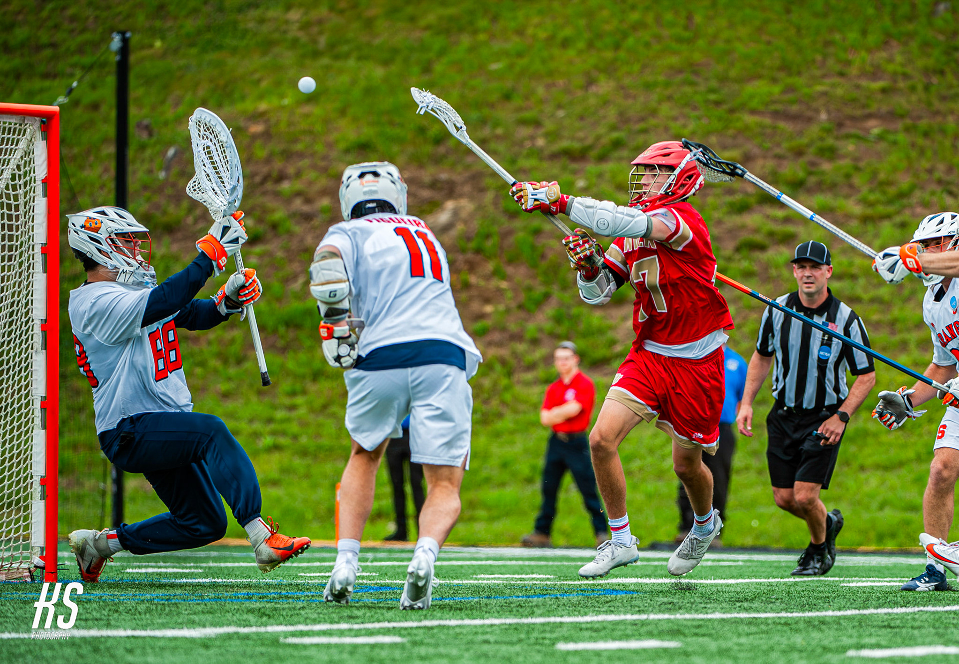 Attackman Cody Malawsky of fifth-seeded University of Denver Men's Lacrosse takes a shot against fourth-seeded Syracuse University goalie Kyle Rolley during the 2024 NCAA Division I Men's Lacrosse Quarterfinals at Unitas Stadium in Towson, MD, on May 19, 2024.