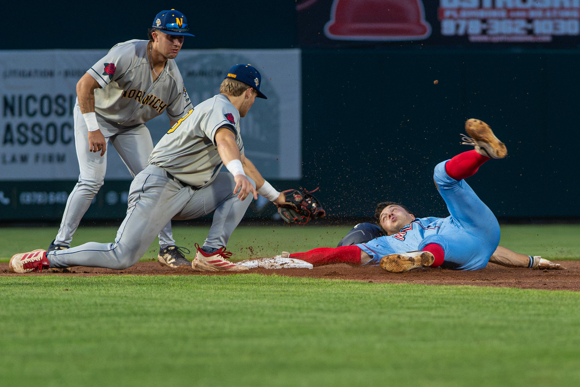 Lowell Spinners' Marco Zirpolo slides on his back trying to get safe against his Norwich Sea Unicorns opponents. The game was played at Edward A. LeLacheur Park, in Lowell, MA, on July 28th, 2026. 
