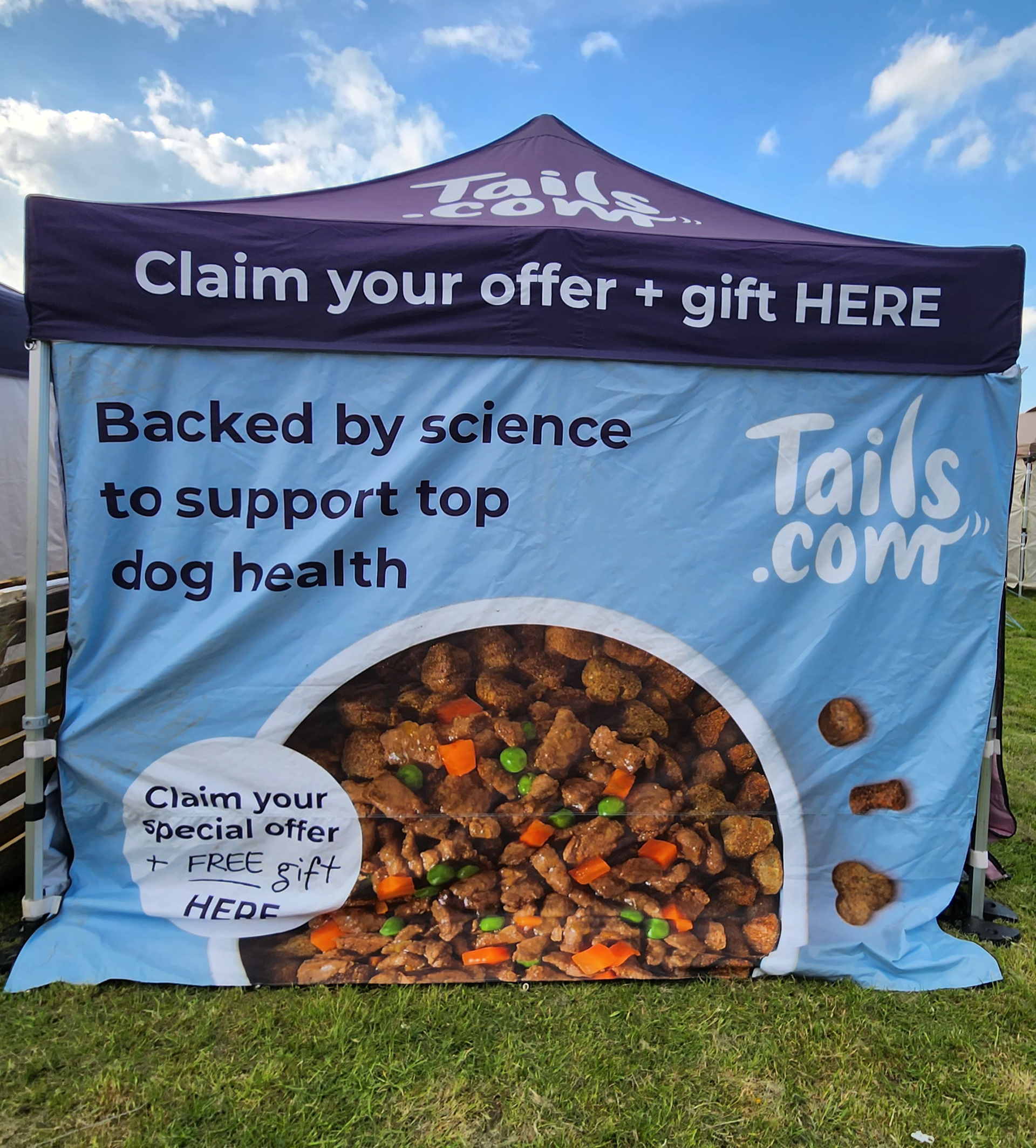 Branded Tails.com Gazebo Displaying Old Packaging Design and Outdated New Customer Offer