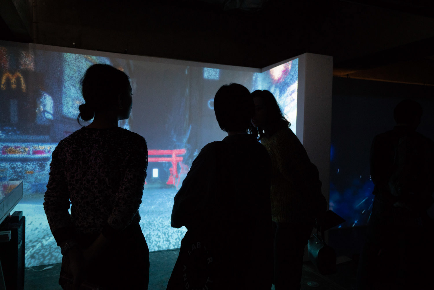 Audience in front of projection.