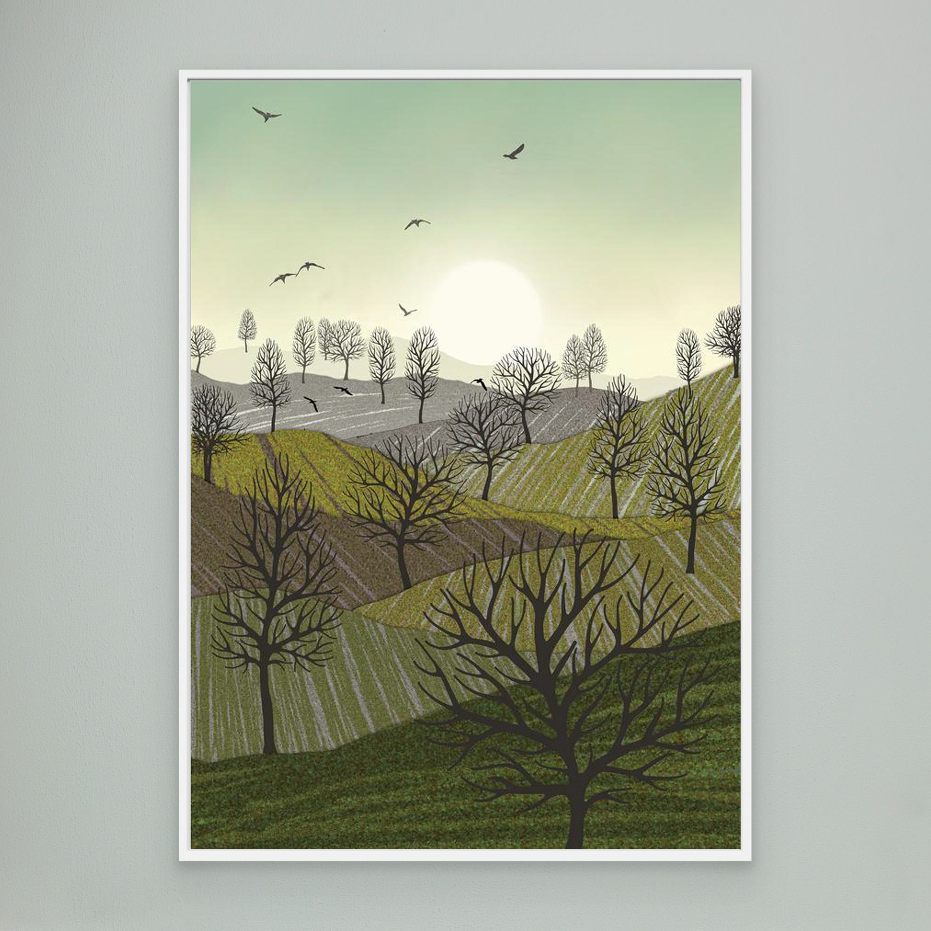 Over the Hills created by Robbie William for WalkinHISlight,, artwork depicting a landscape dotted with various trees with the sun shining in the background and birds flying. Reductive in nature. Shades of white, grey's, greens through to black.. Available as a canvas print and paper print framed or unframed in various sizes. Contemporary/modern in style..