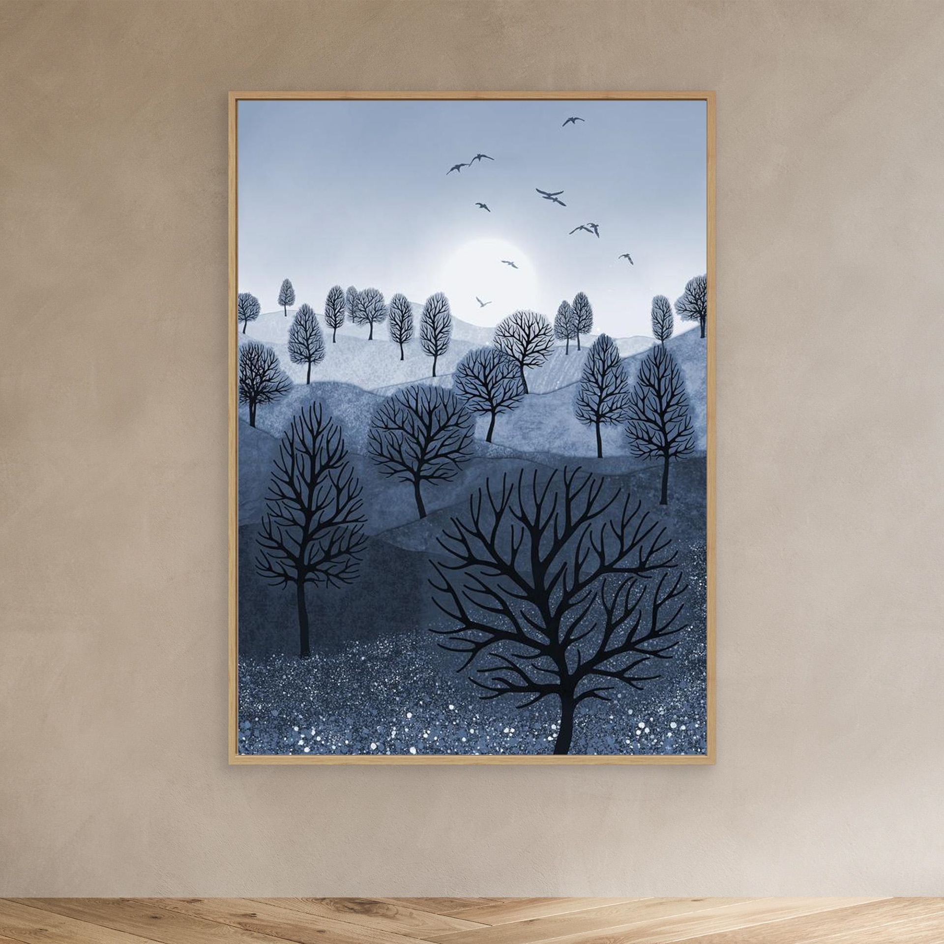 A Splash of Colour 'Blue' created by Robbie William for WalkinHISlight,, artwork depicting a landscape dotted with various trees with the sun shining in the background, with a field of flowers in the foreground and birds flying. Reductive in nature. Shades of white, blue,, through to black.  Available as a canvas print and paper print framed or unframed in various sizes. Contemporary/modern in style..