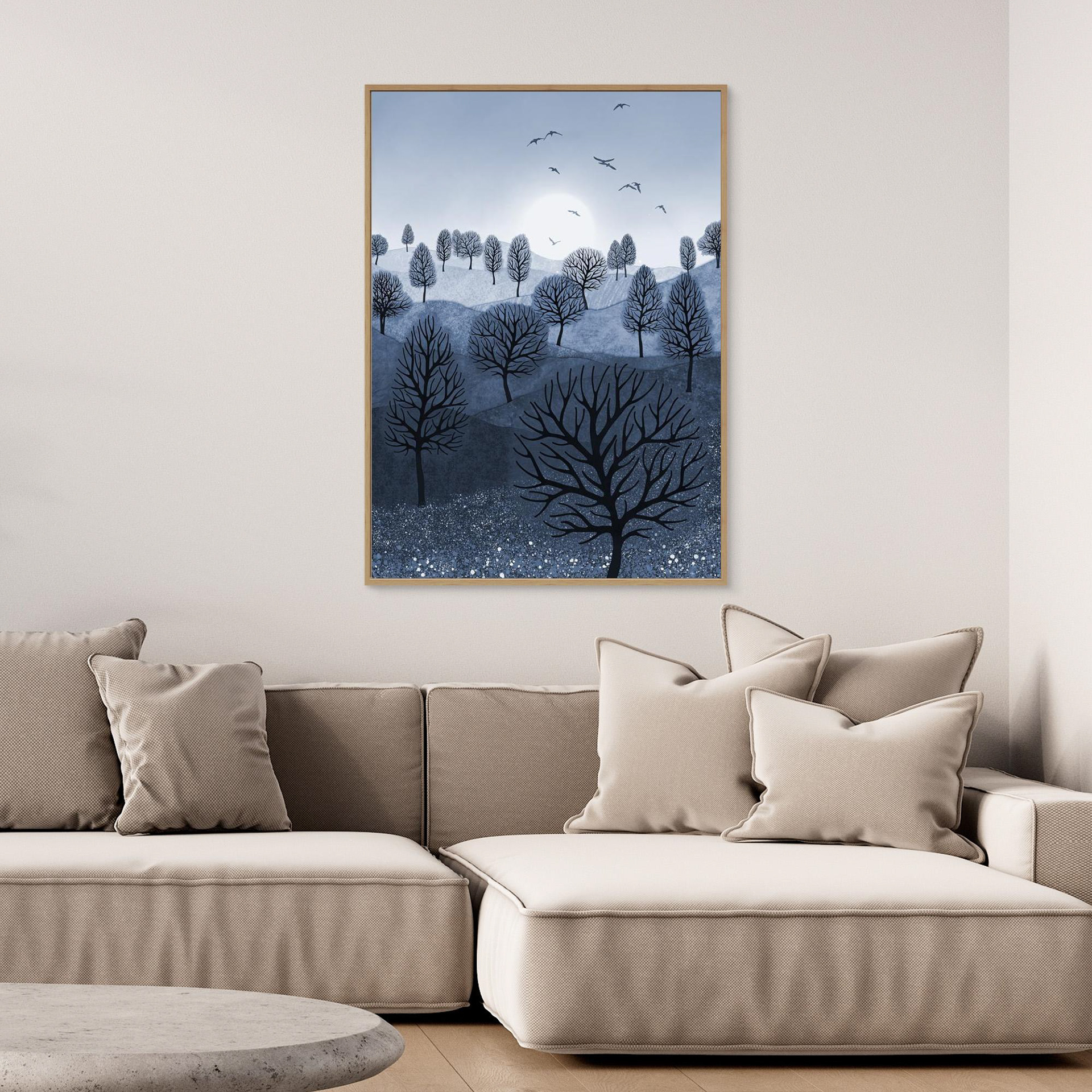 A Splash of Colour 'Blue' created by Robbie William for WalkinHISlight,, artwork depicting a landscape dotted with various trees with the sun shining in the background, with a field of flowers in the foreground and birds flying. Reductive in nature. Shades of white, blue,, through to black.  Available as a canvas print and paper print framed or unframed in various sizes. Contemporary/modern in style..