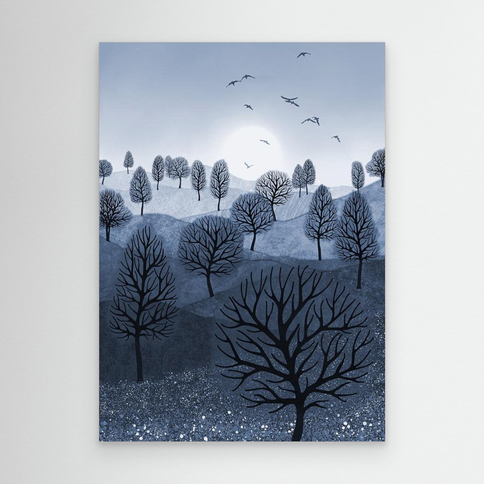 A Splash of Colour 'Blue' created by Robbie William for WalkinHISlight,, artwork depicting a landscape dotted with various trees with the sun shining in the background, with a field of flowers in the foreground and birds flying. Reductive in nature. Shades of white, blue,, through to black.  Available as a canvas print and paper print framed or unframed in various sizes. Contemporary/modern in style..