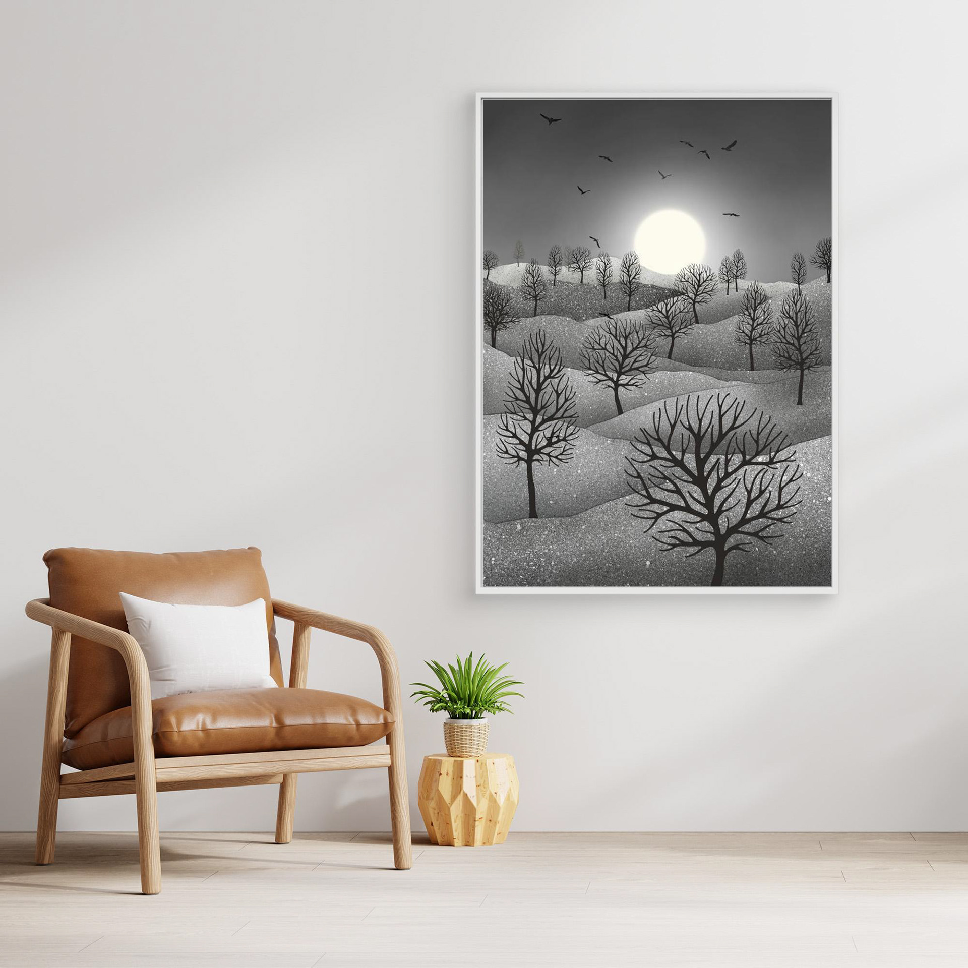 Winter Sparkles, artwork created by Robbie William for WalkinHISlight, depicting a landscape dotted with various trees with the sun shining in the background and birds flying. Reductive in nature. Shades of white, grey through to black.. Available as a canvas print and paper print framed or unframed in various sizes. Contemporary/modern in style..