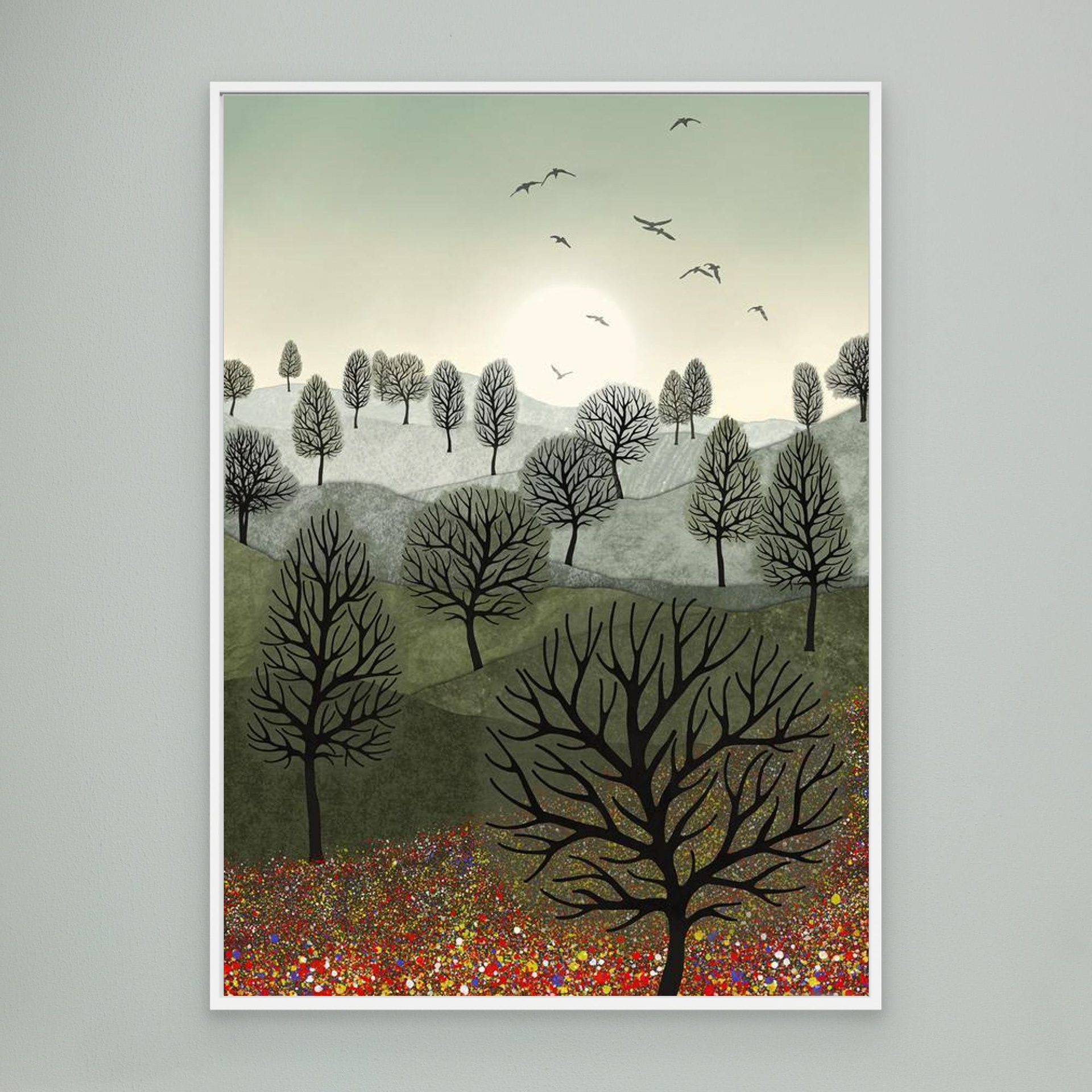 A Splash of Colour created by Robbie William for WalkinHISlight,, artwork depicting a landscape dotted with various trees with the sun shining in the background, with a field of flowers in the forground and birds flying. Reductive in nature. Shades of white, grey's, greens through to black.. Available as a canvas print and paper print framed or unframed in various sizes. Contemporary/modern in style..