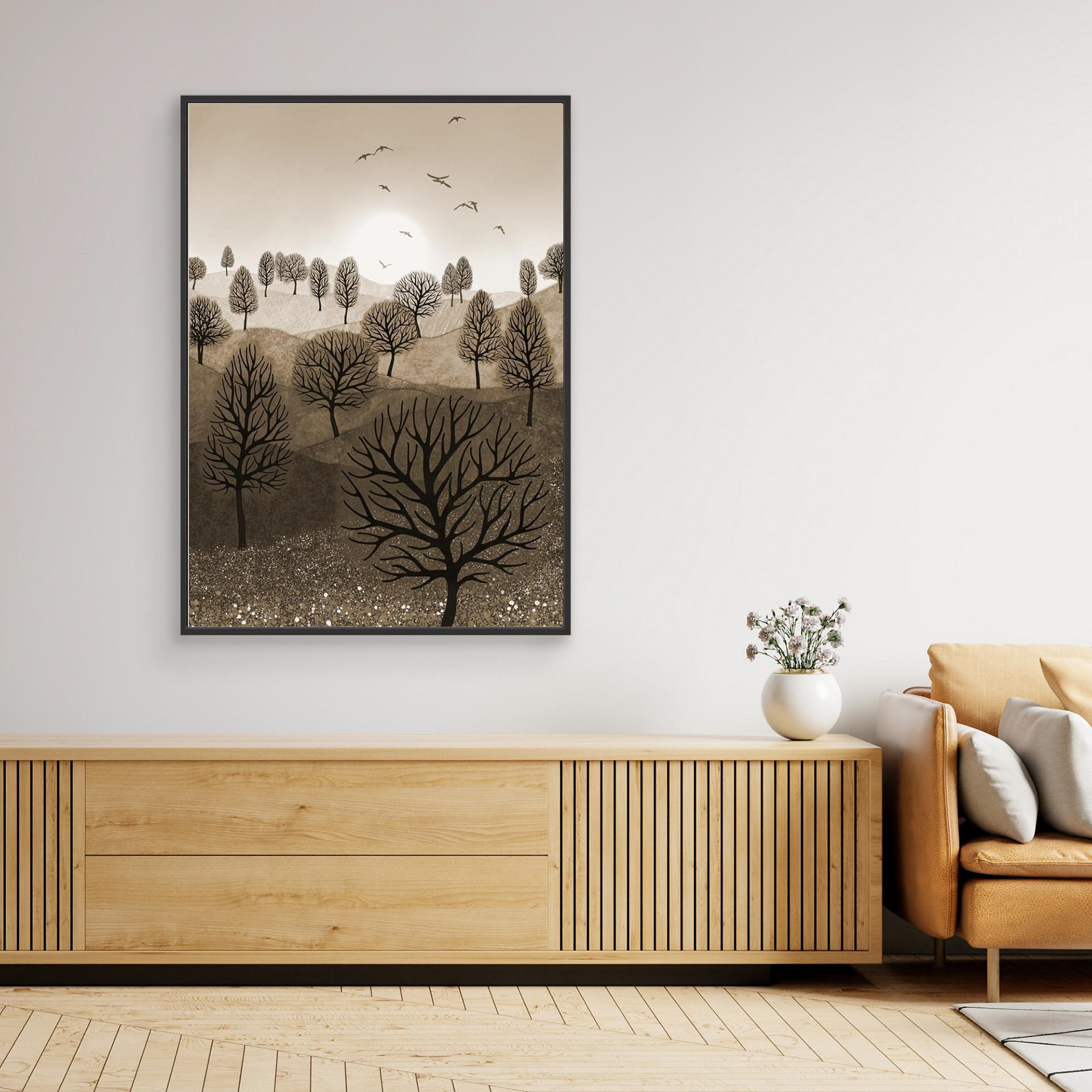 A Splash of Colour 'Sepia' created by Robbie William for WalkinHISlight,, artwork depicting a landscape dotted with various trees with the sun shining in the background, with a field of flowers in the forground and birds flying. Reductive in nature. Shades of white, beige, browns through to black.  Available as a canvas print and paper print framed or unframed in various sizes. Contemporary/modern in style..