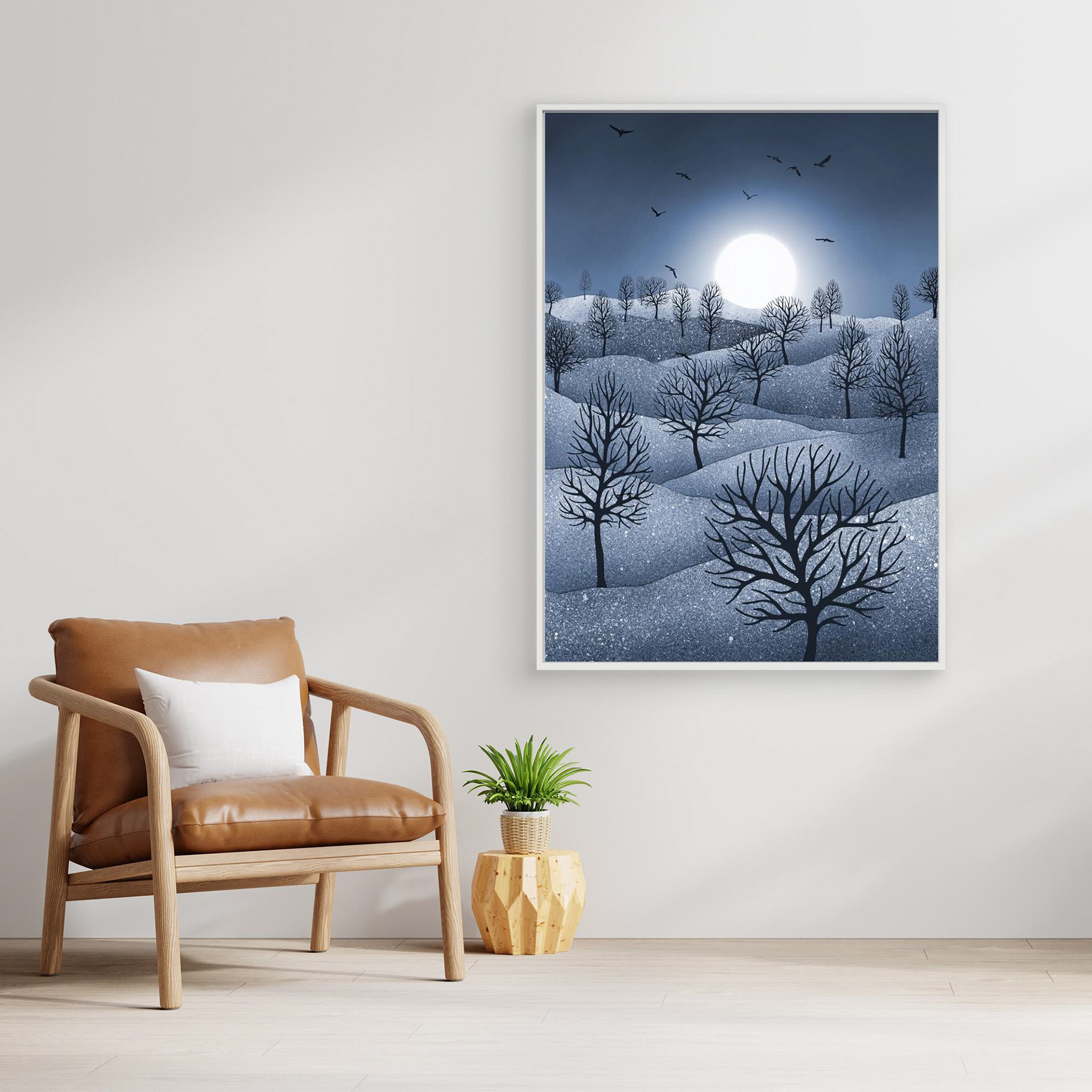 Winter Sparkles,'Blue' artwork created by Robbie William for WalkinHISlight, depicting a landscape dotted with various trees with the sun shining in the background and birds flying. Reductive in nature. Shades of white, blue through to black.. Available as a canvas print and paper print framed or unframed in various sizes. Contemporary/modern in style..