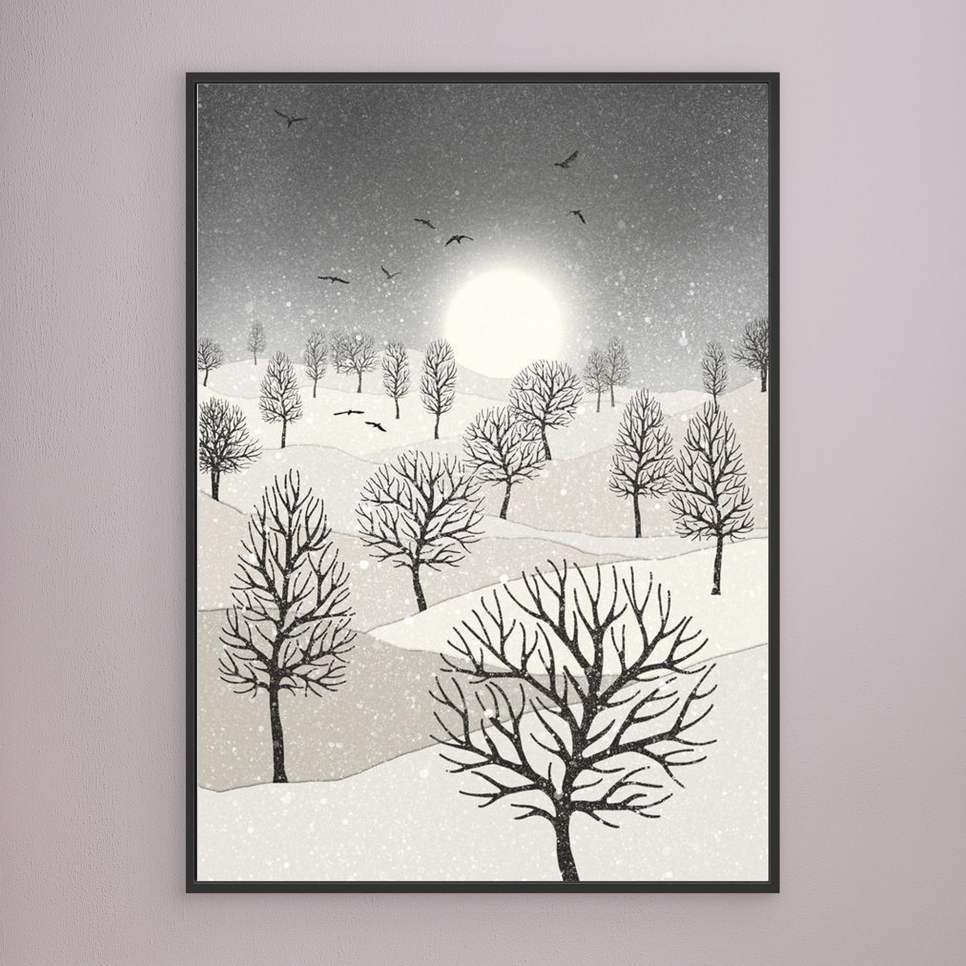 Winter Sun, artwork created by Robbie William for WalkinHISlight, depicting snow falling on a landscape dotted with various trees with the sun shining in the background and birds flying. Reductive in nature. Shades of white, grey's through to black.. Available as a canvas print and paper print framed or unframed in various sizes. Contemporary/modern in style..