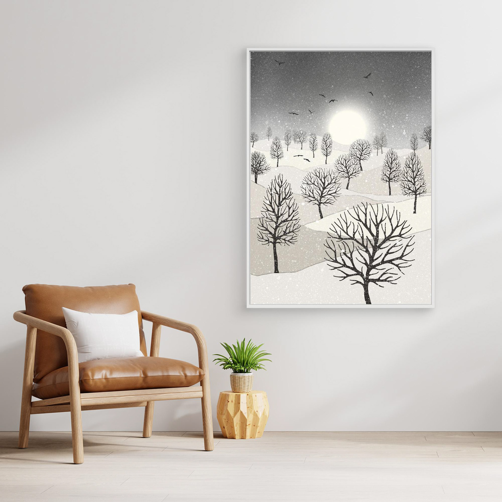 Winter Sun, artwork created by Robbie William for WalkinHISlight, depicting snow falling on a landscape dotted with various trees with the sun shining in the background and birds flying. Reductive in nature. Shades of white, grey's through to black.. Available as a canvas print and paper print framed or unframed in various sizes. Contemporary/modern in style..