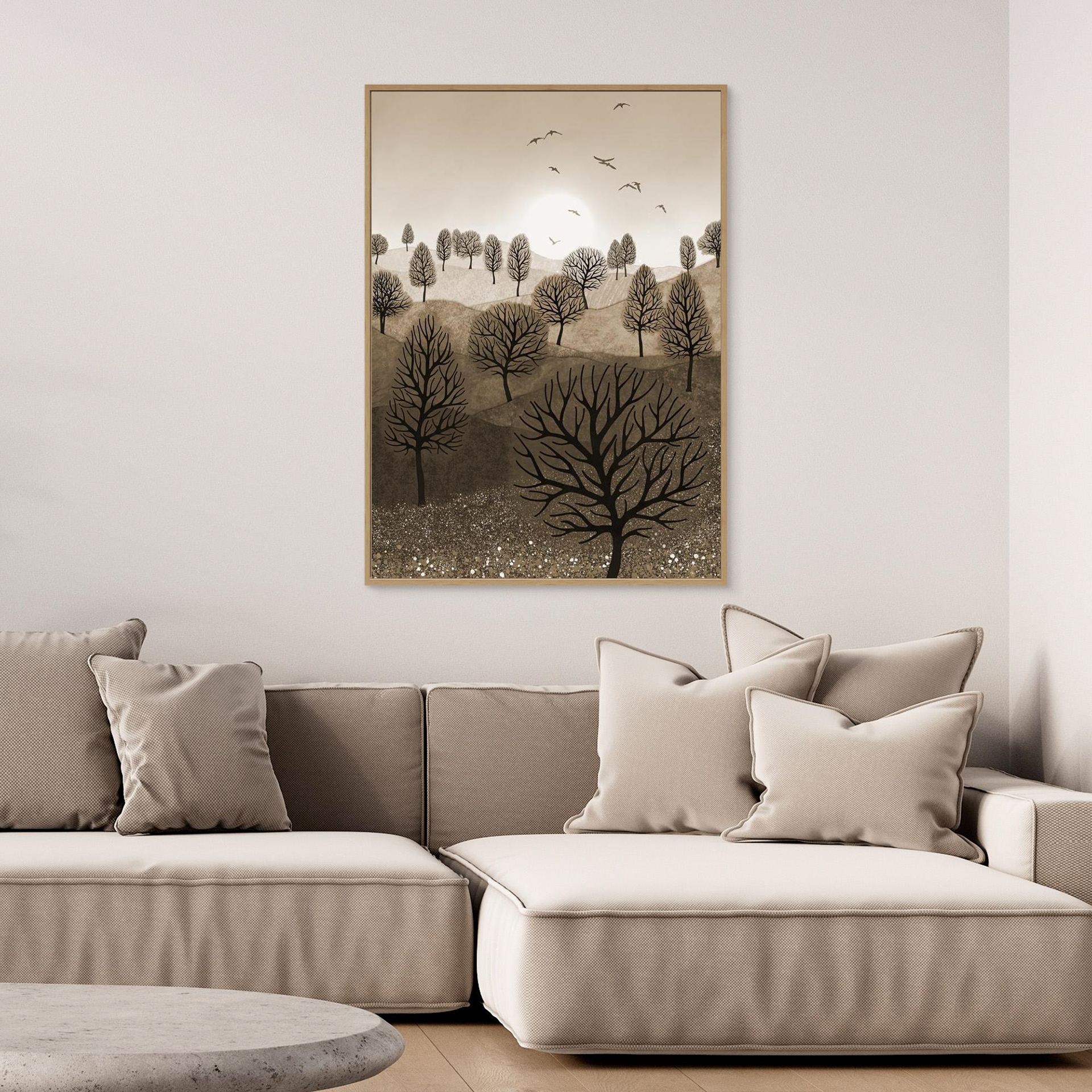 A Splash of Colour 'Sepia' created by Robbie William for WalkinHISlight,, artwork depicting a landscape dotted with various trees with the sun shining in the background, with a field of flowers in the forground and birds flying. Reductive in nature. Shades of white, beige, browns through to black.  Available as a canvas print and paper print framed or unframed in various sizes. Contemporary/modern in style..