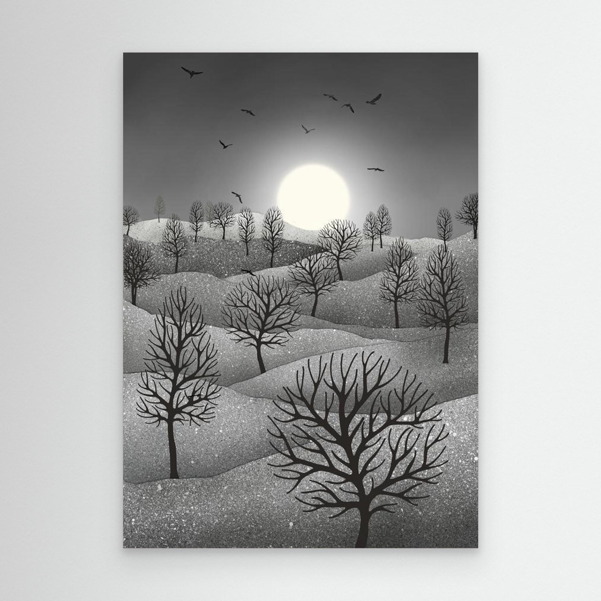Winter Sparkles, artwork created by Robbie William for WalkinHISlight, depicting a landscape dotted with various trees with the sun shining in the background and birds flying. Reductive in nature. Shades of white, grey through to black.. Available as a canvas print and paper print framed or unframed in various sizes. Contemporary/modern in style..
