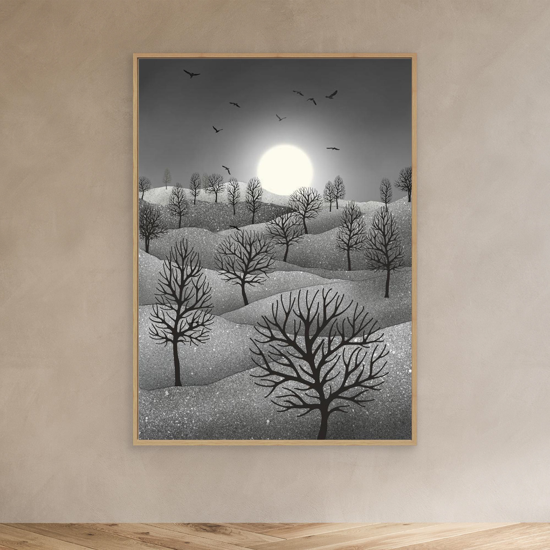 Winter Sparkles, artwork created by Robbie William for WalkinHISlight, depicting a landscape dotted with various trees with the sun shining in the background and birds flying. Reductive in nature. Shades of white, grey through to black.. Available as a canvas print and paper print framed or unframed in various sizes. Contemporary/modern in style..