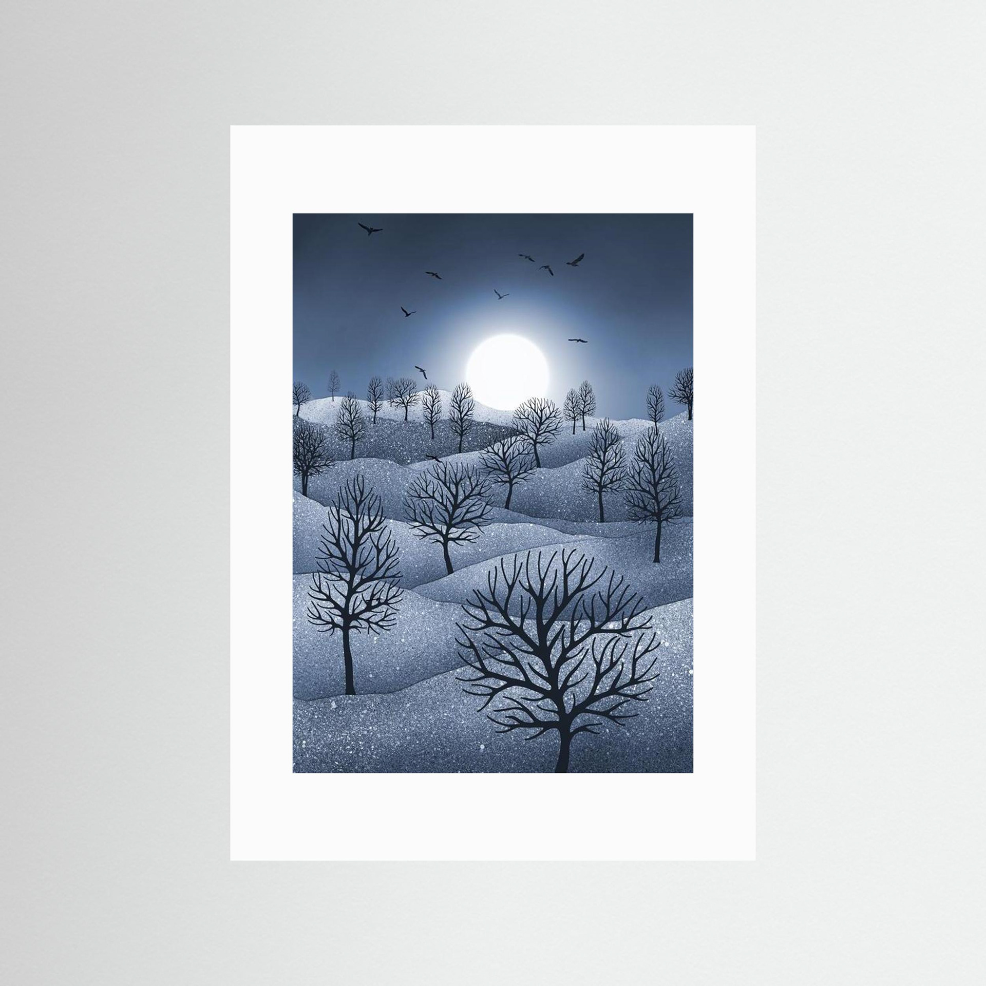 Winter Sparkles,'Blue' artwork created by Robbie William for WalkinHISlight, depicting a landscape dotted with various trees with the sun shining in the background and birds flying. Reductive in nature. Shades of white, blue through to black.. Available as a canvas print and paper print framed or unframed in various sizes. Contemporary/modern in style..