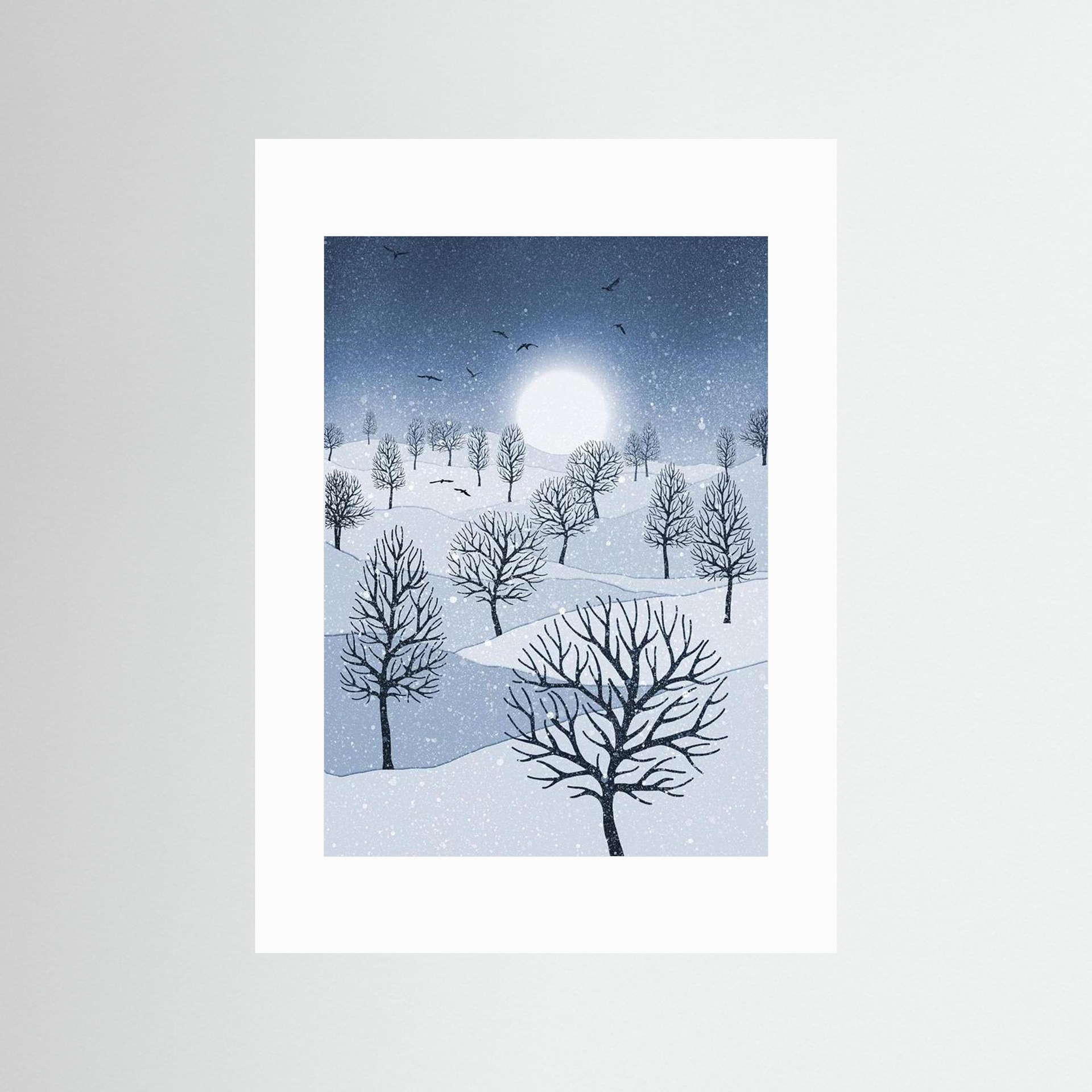Winter Sun, artwork created by Robbie William for WalkinHISlight, depicting snow falling on a landscape dotted with various trees with the sun shining in the background and birds flying. Reductive in nature. Shades of white, blue through to black.. Available as a canvas print and paper print framed or unframed in various sizes. Contemporary/modern in style. 