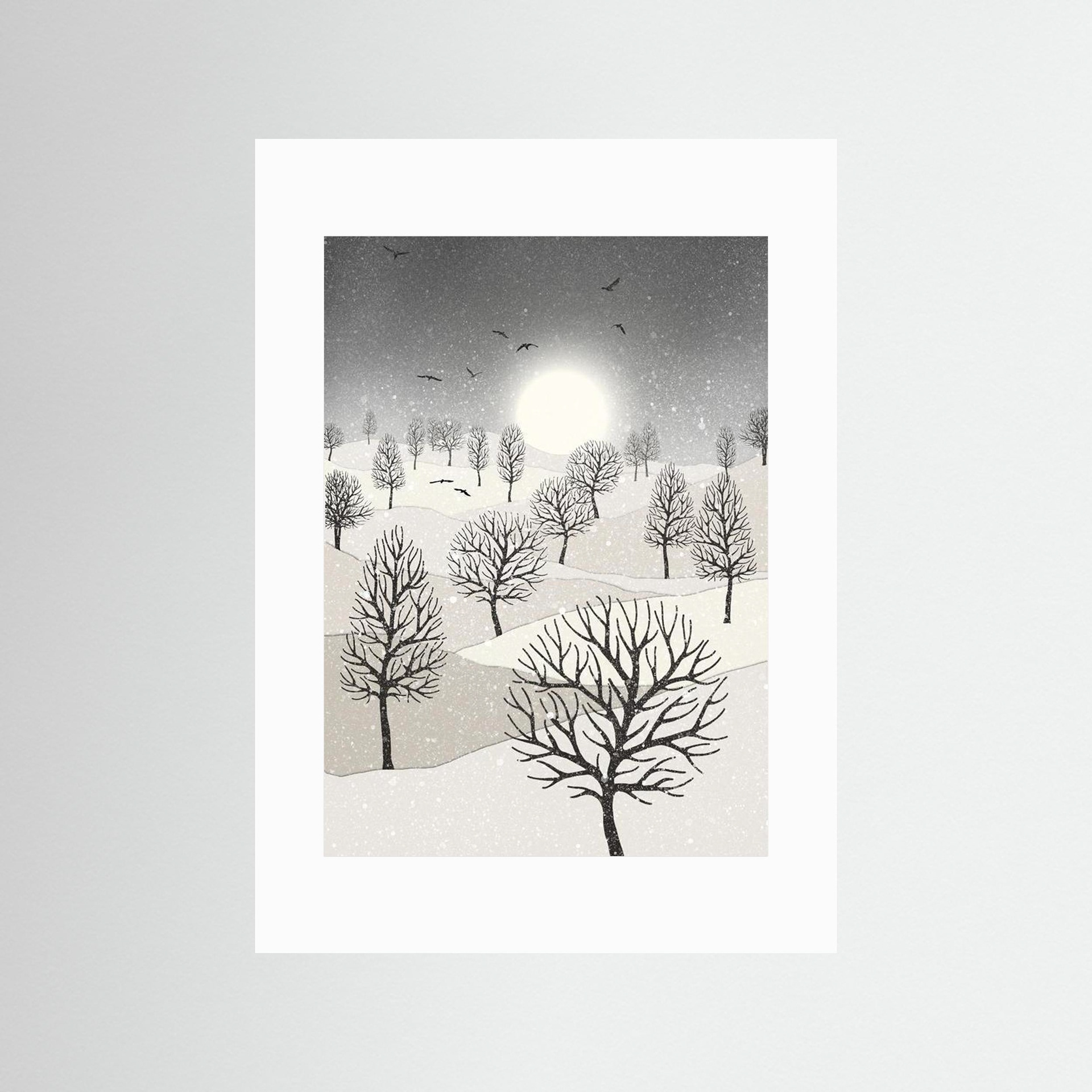 Winter Sun, artwork created by Robbie William for WalkinHISlight, depicting snow falling on a landscape dotted with various trees with the sun shining in the background and birds flying. Reductive in nature. Shades of white, grey's through to black.. Available as a canvas print and paper print framed or unframed in various sizes. Contemporary/modern in style..