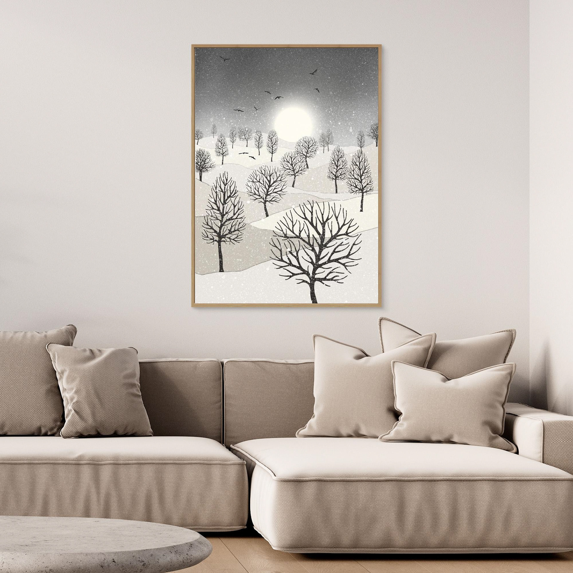 Winter Sun, artwork created by Robbie William for WalkinHISlight, depicting snow falling on a landscape dotted with various trees with the sun shining in the background and birds flying. Reductive in nature. Shades of white, grey's through to black.. Available as a canvas print and paper print framed or unframed in various sizes. Contemporary/modern in style..