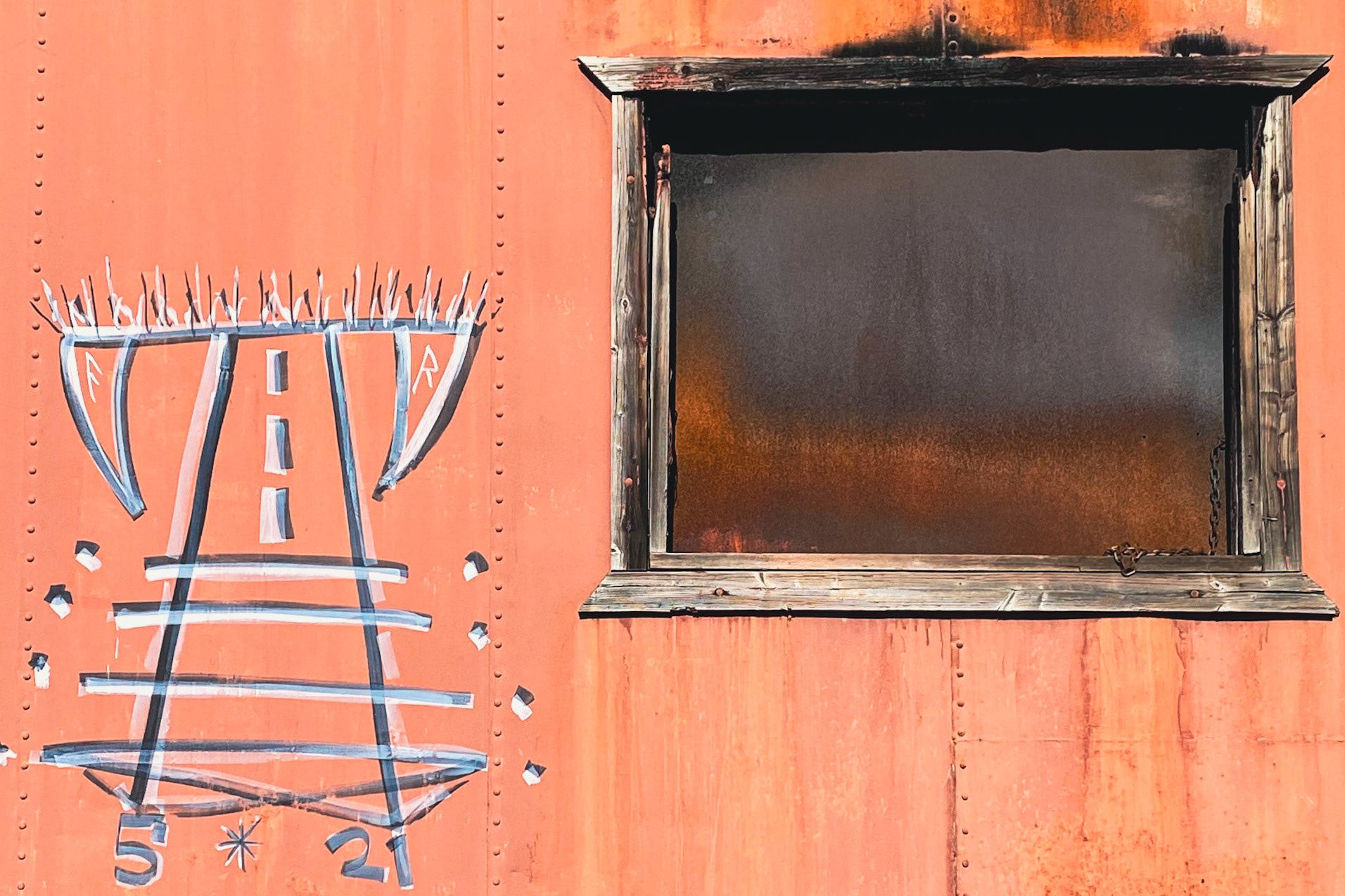 Industrial surface rewritten by time and paint