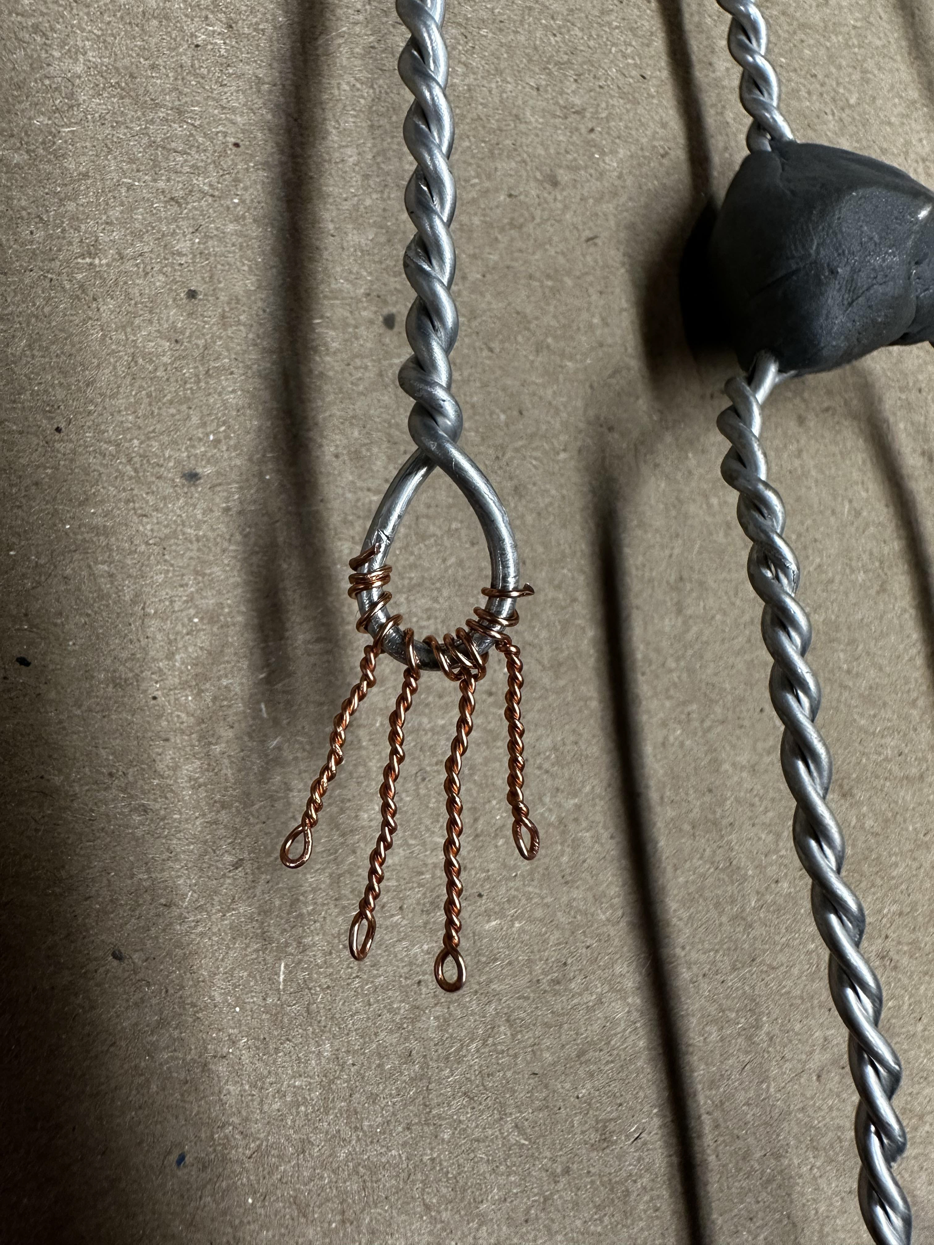 twisted wire fingers