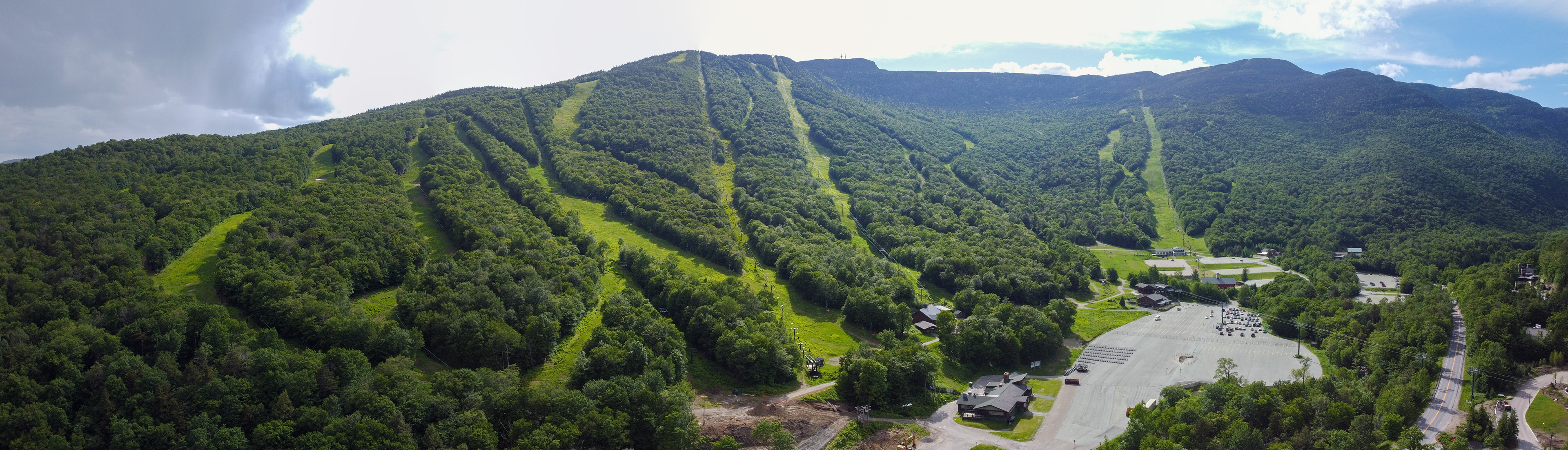 A panoramic aerial view of the Stowe Mountain ski trails in Stowe, Vermont.