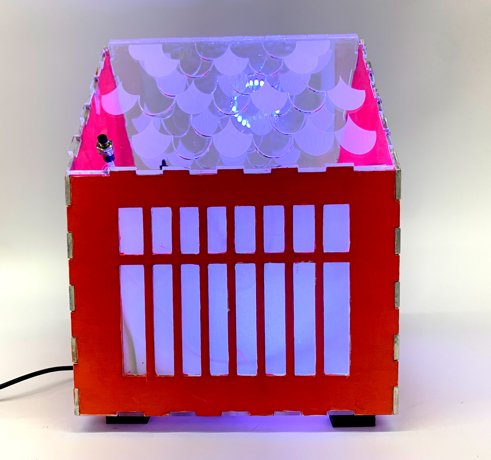 There is an button on the side to change the color of the Neopixel for user customization
