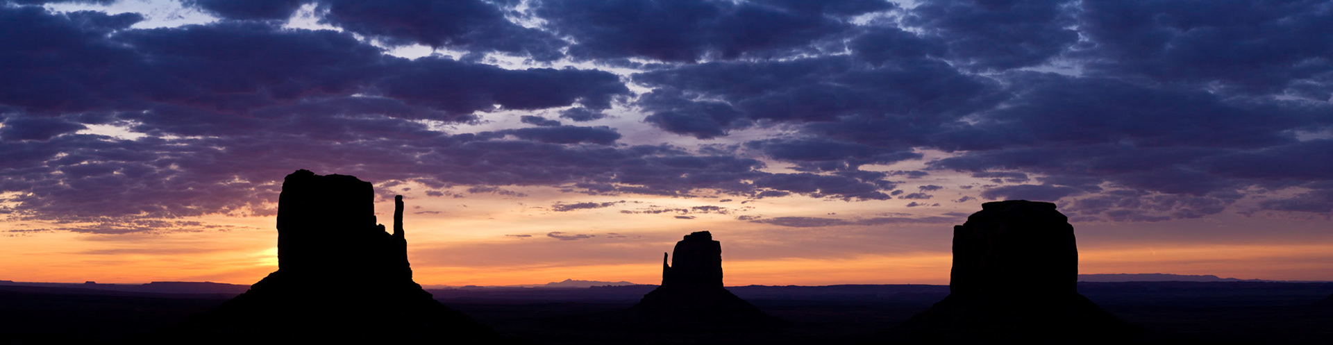 The Mittens and Merrick Butte at Sunrise (Wide Panorama), Monument Valley, Arizona / Utah