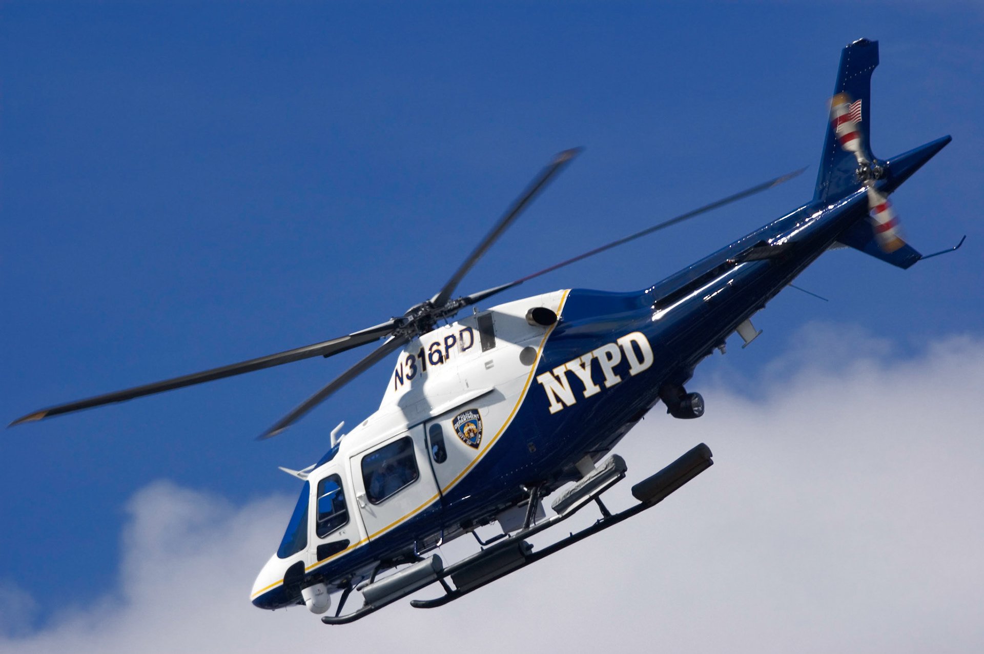 NYPD Helicopter close to Empire State Building, New York