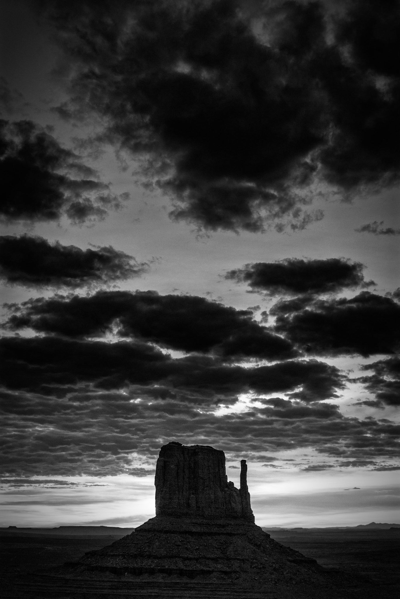 Sun Rising Behind West Mitten, Monument Valley, Arizona / Utah
