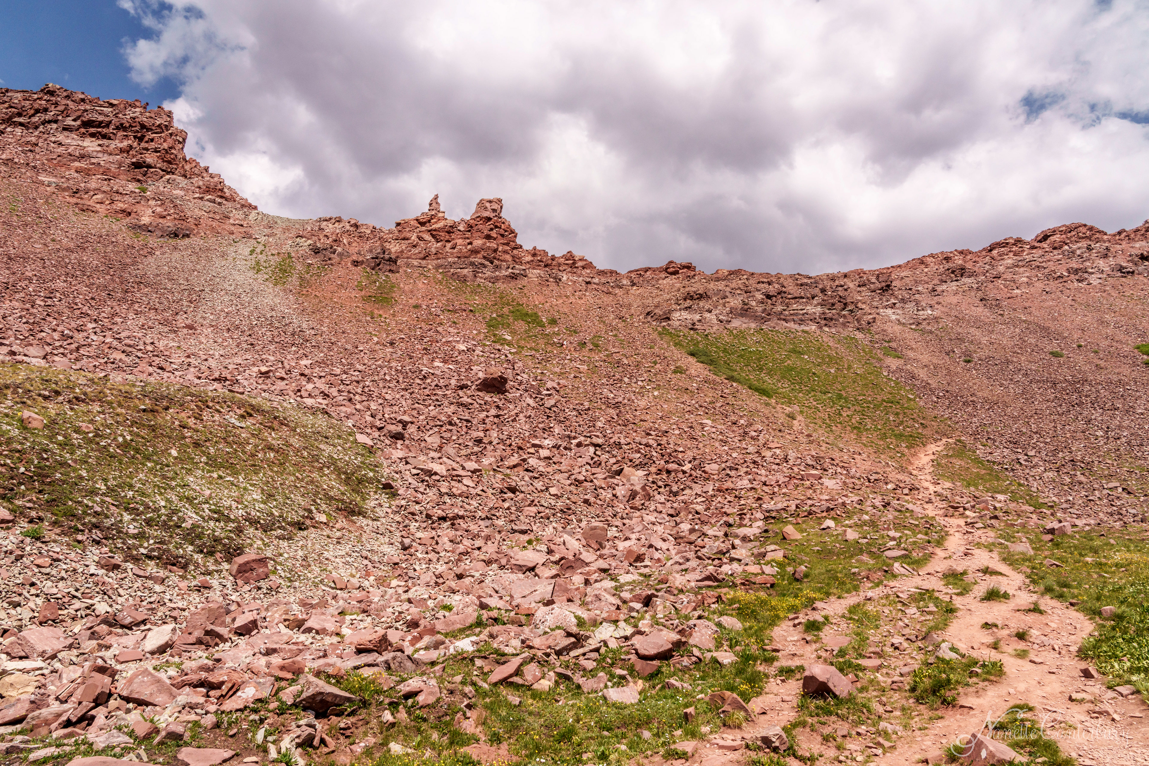 Looking back at West Maroon Pass. The two knobs are the pass.