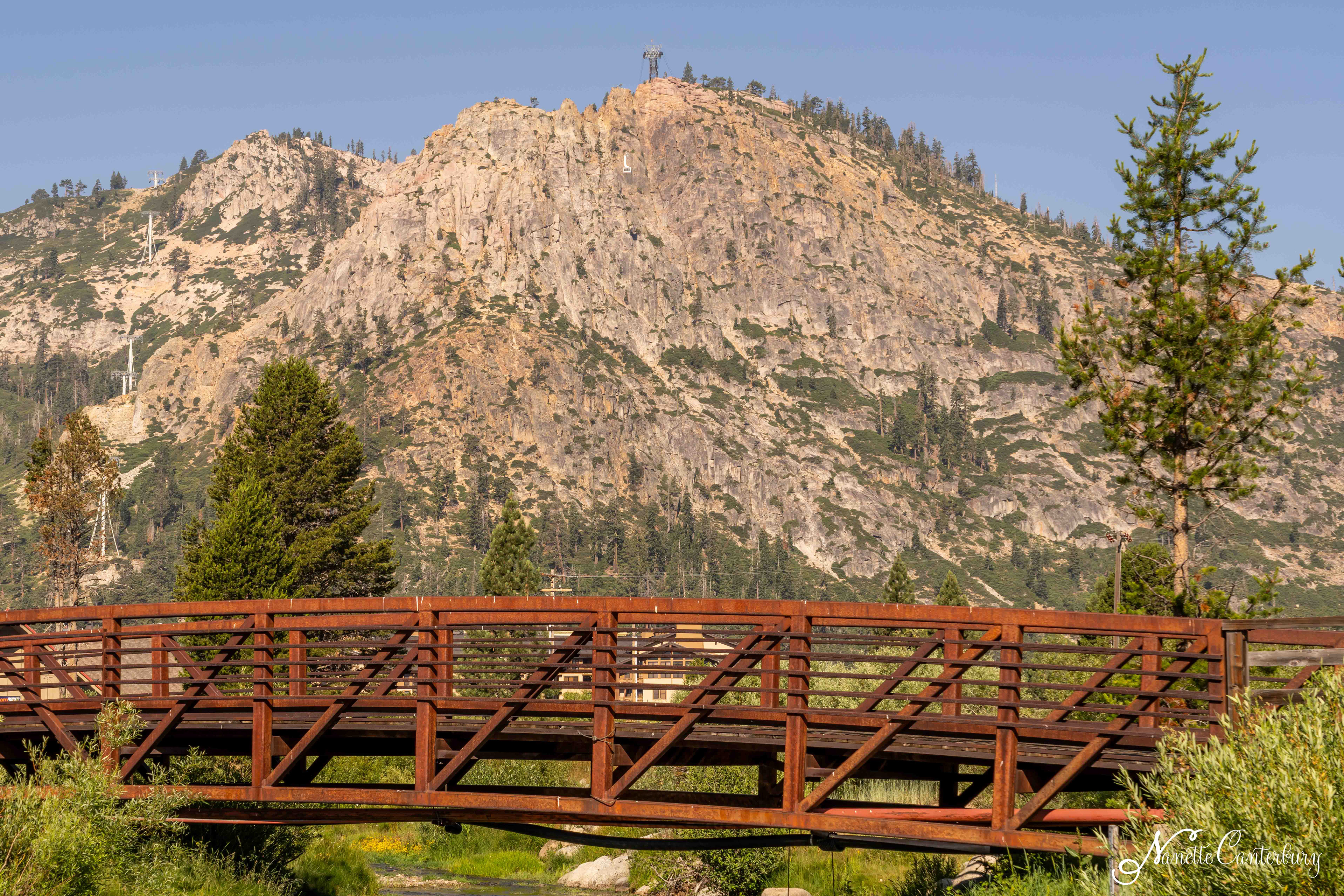 In Squaw Valley, the aerial tram is a 10 minute ride that climbs 2,000 vertical feet. The mountain below is the tram face.