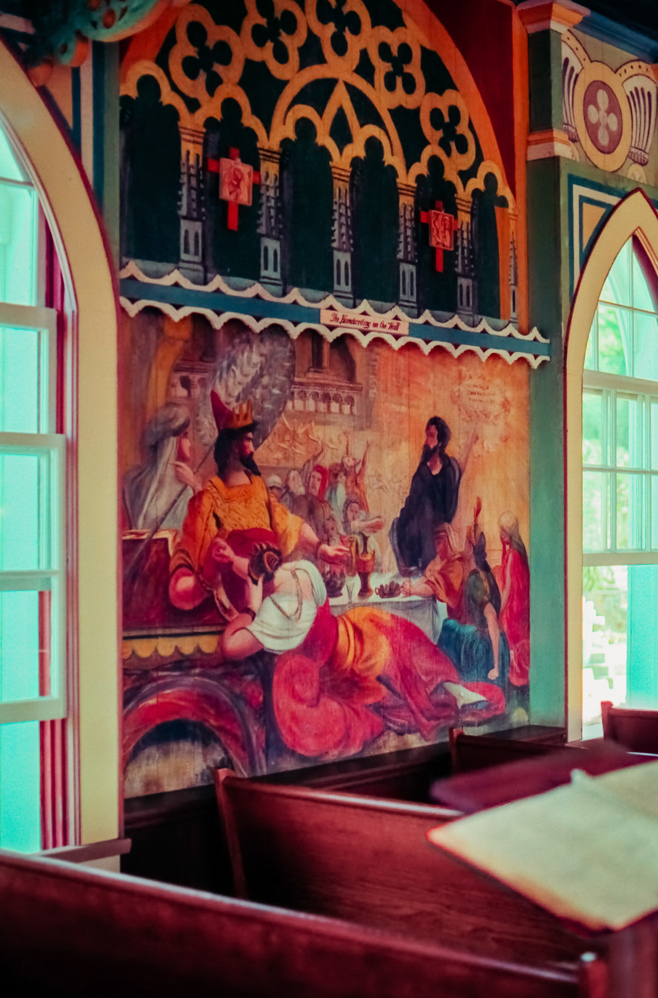 One of the six sidewall murals painted by Father John Velghe  using house paint on wood. The Pinted Church, which is located on the Island of Hawaii, was erected at its present location in 1899, and it took the priest four years to complete the paintings.Image captured on Kodak Royal Gold 100 color negative film. After scanning it with an Epson Perfection V750 PRO using Silverfast software, the ColorPerfect Plugin from CFSystems converted the negative image to a positive image in Photoshop. Post-processing completed in Lightroom Classic.