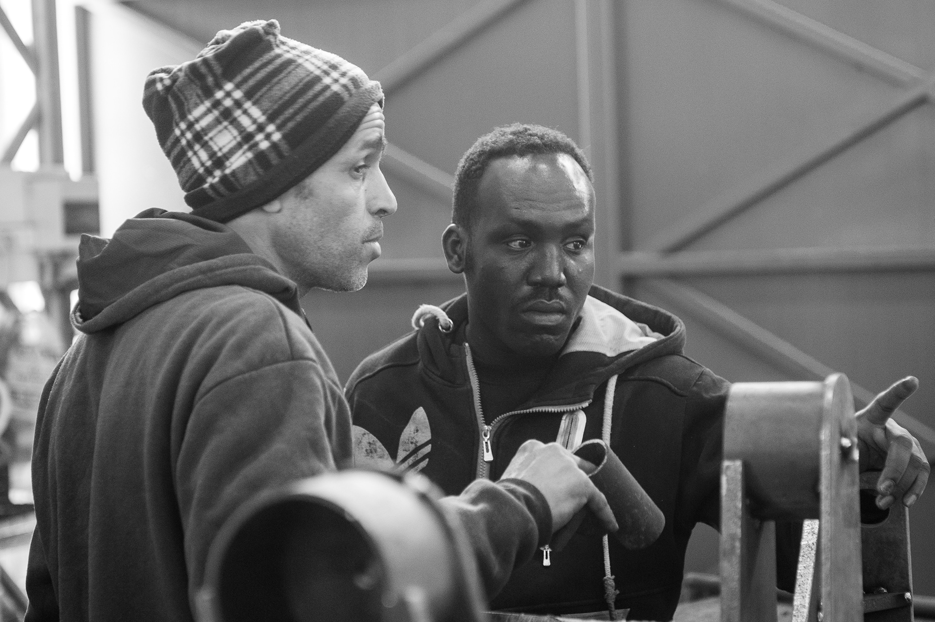 Locksmith Bedouin is explaining to his Sudanese colleague how to build a construction